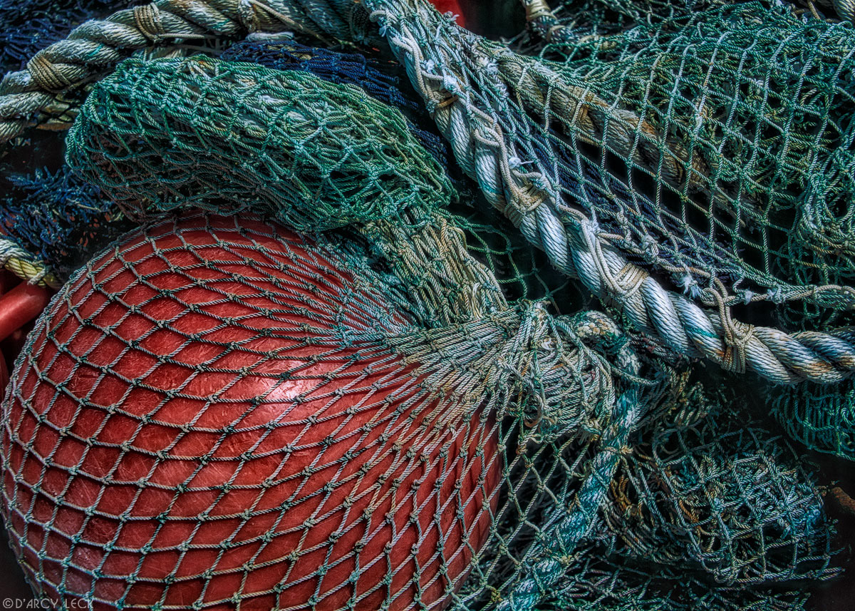Fishing net and orange float in Florence, Oregon