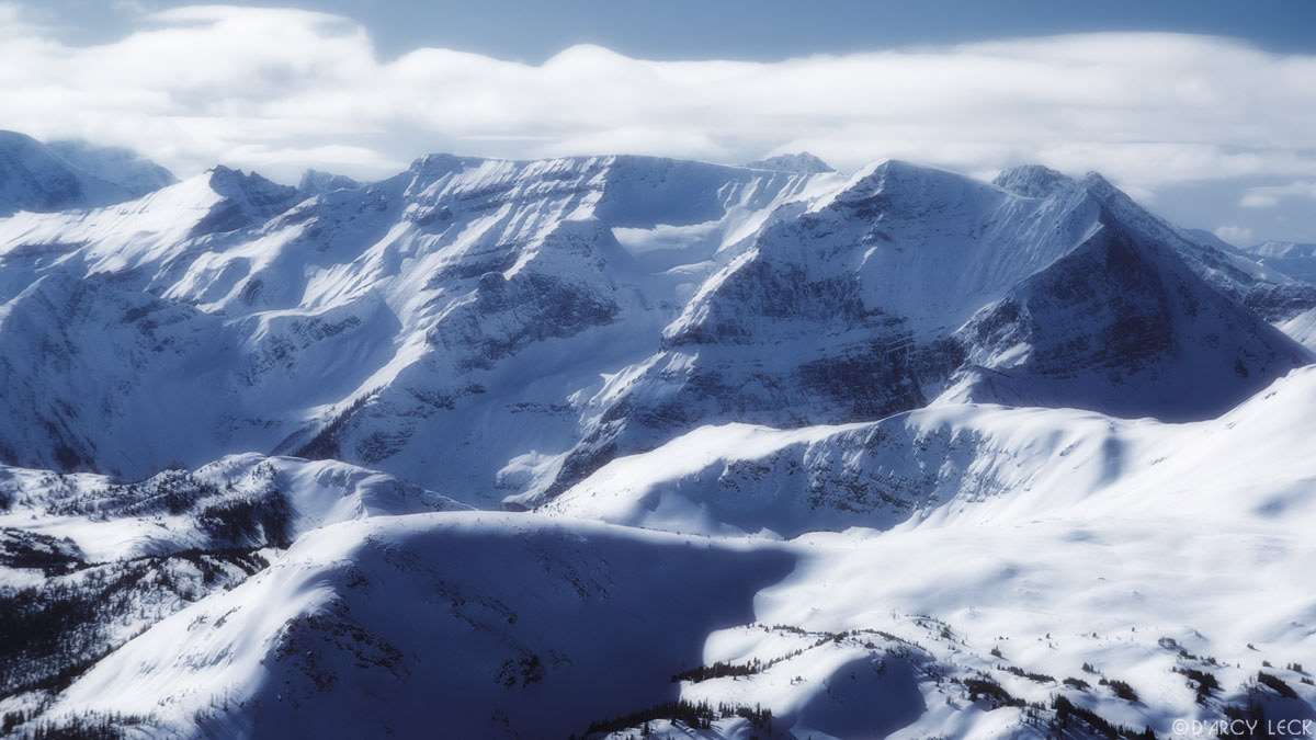 Winter snow covers Mitchell Range in the Rocky Mountains, Canada