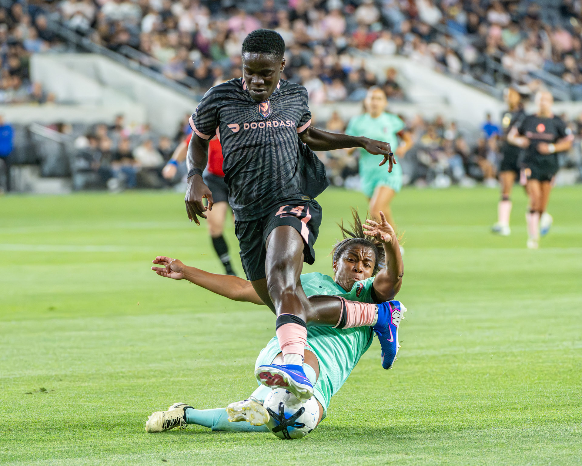 KC Current defender slides against Prisca Chilufya (#24/W) on May 20th 2026.