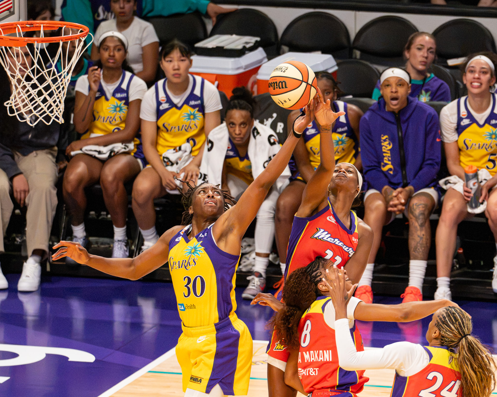 LA Sparks Nneka Ogwumike (#30/PF) fights for a rebound against the Phoenix Mercury on July 22nd 2026.