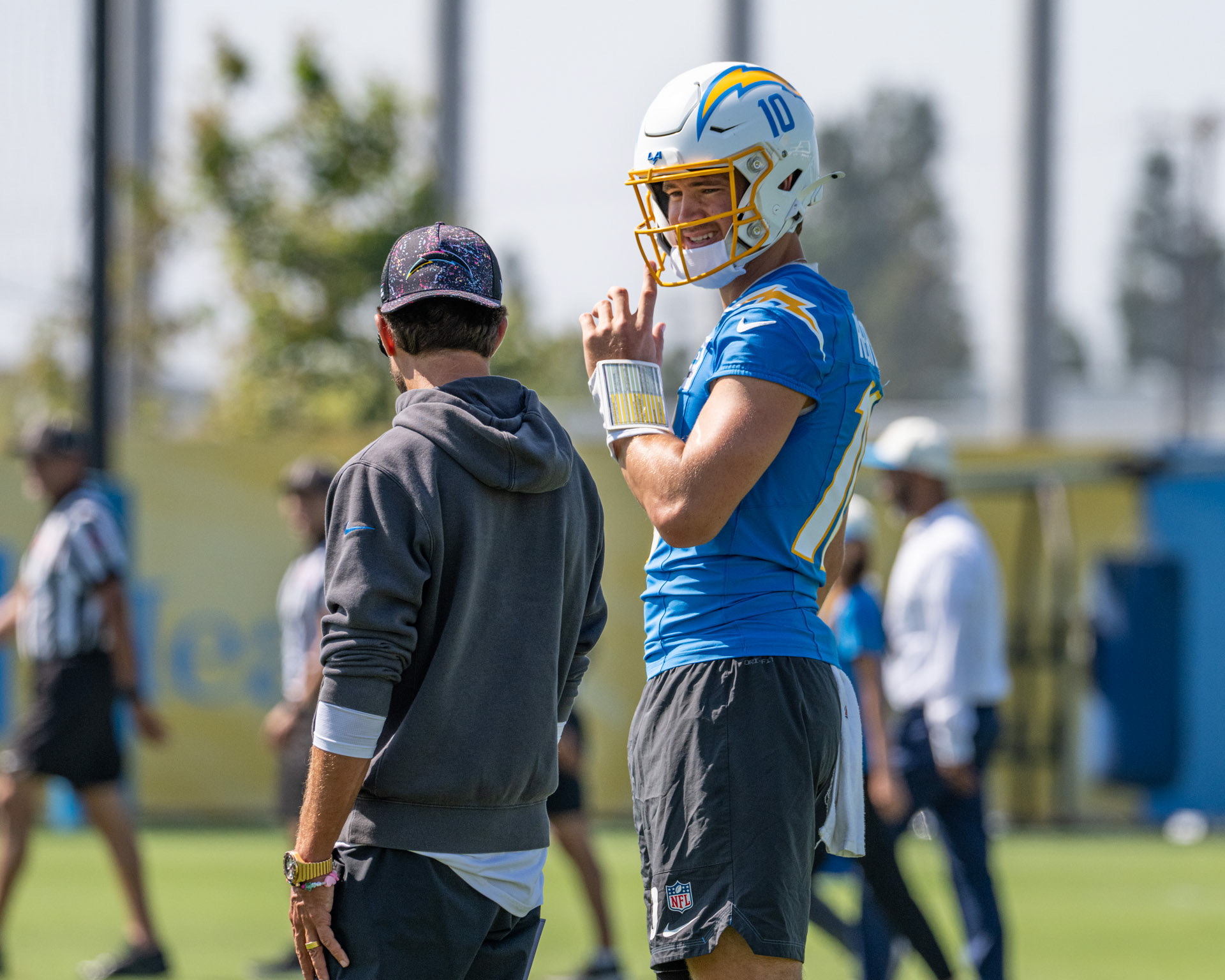 LA Chargers Justin Herbert (#10/QB) with Offensive Coordinator Mike McDaniel at the Bolt during 2026 summer training camp.