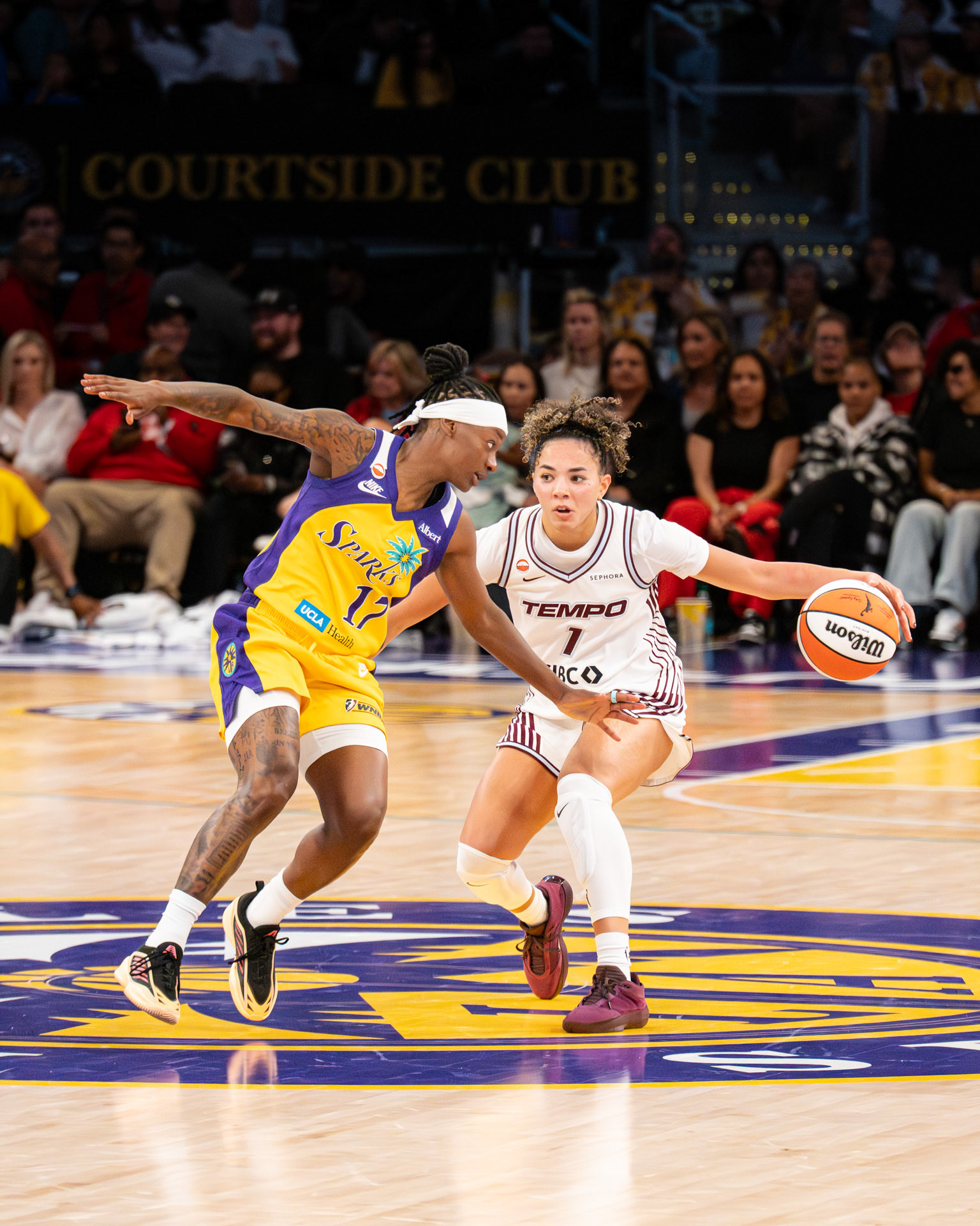 Toronto Tempo Kiki Rice (#1/PG) makes a crossover while being guarded by LA Sparks Erica Wheeler (#17/SG) on May 17th 2026.
