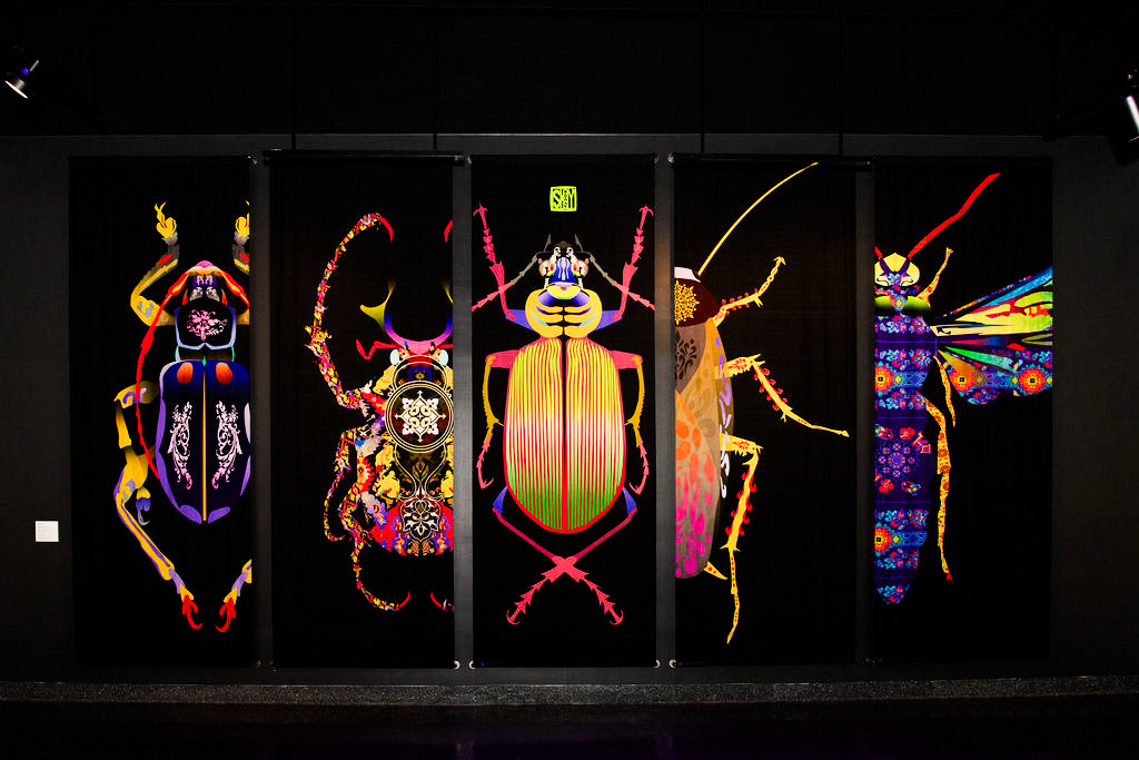 Five silk panels of silk, 4 feet by 12 feet, together they are 25 feet wide. Left to Right (Japanese beetle, Scythian bug, Fiery Sercher, American Cockroach, Ukrainian Megascolia)