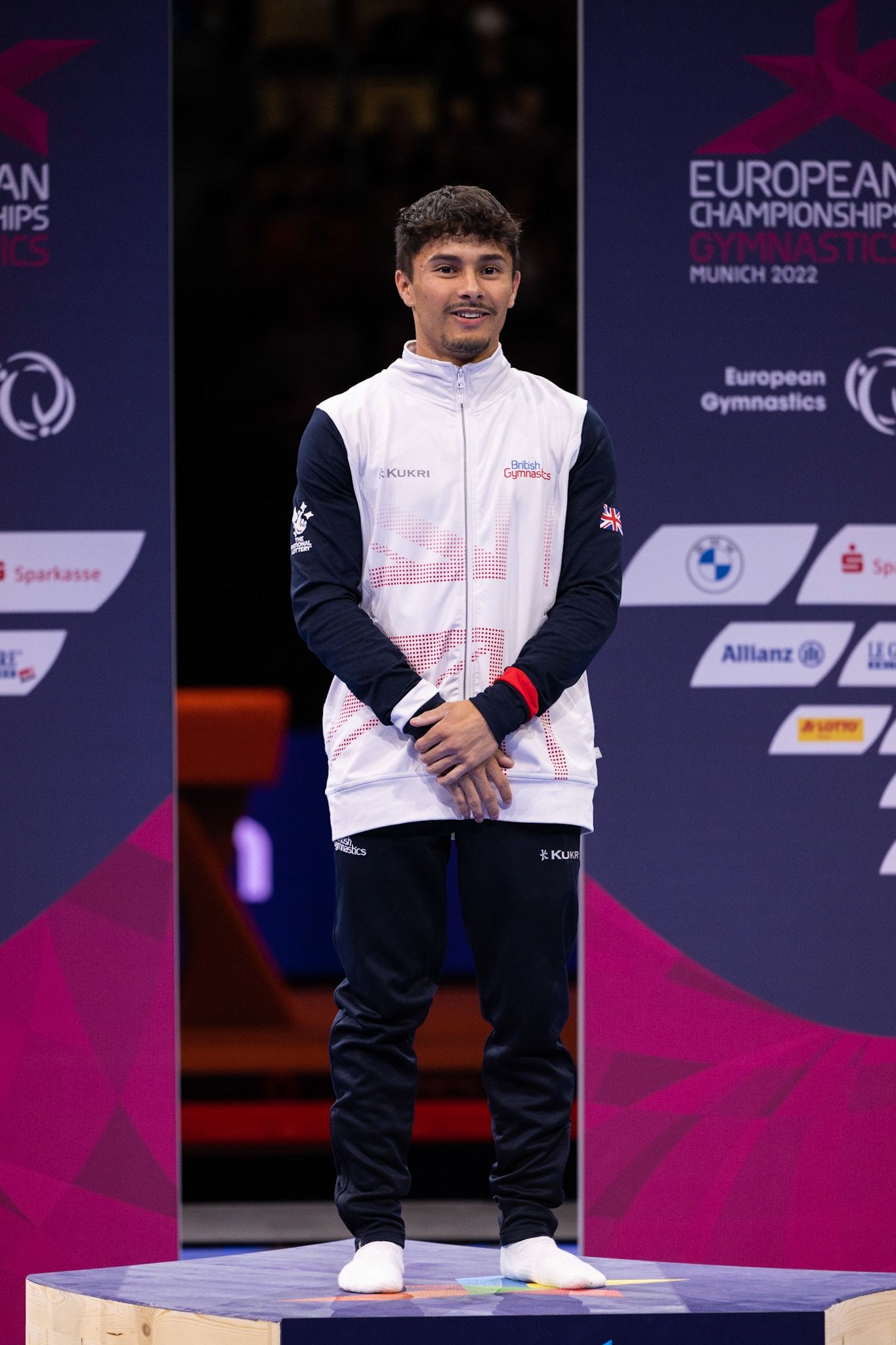 European Championships 2022, Apparatus Final, Victory CeremonyDepicted: Jake JarmanPhoto taken in Munich, DEU on 2022-08-21Photo credits should read: Norman Seibert, CC BY-SA 4.0NIKON Z 9, NIKKOR Z 70-200mm f/2.8 VR S¹⁄₈₀₀ Sek. bei ƒ / 4,0File: DSC_4854.NEF