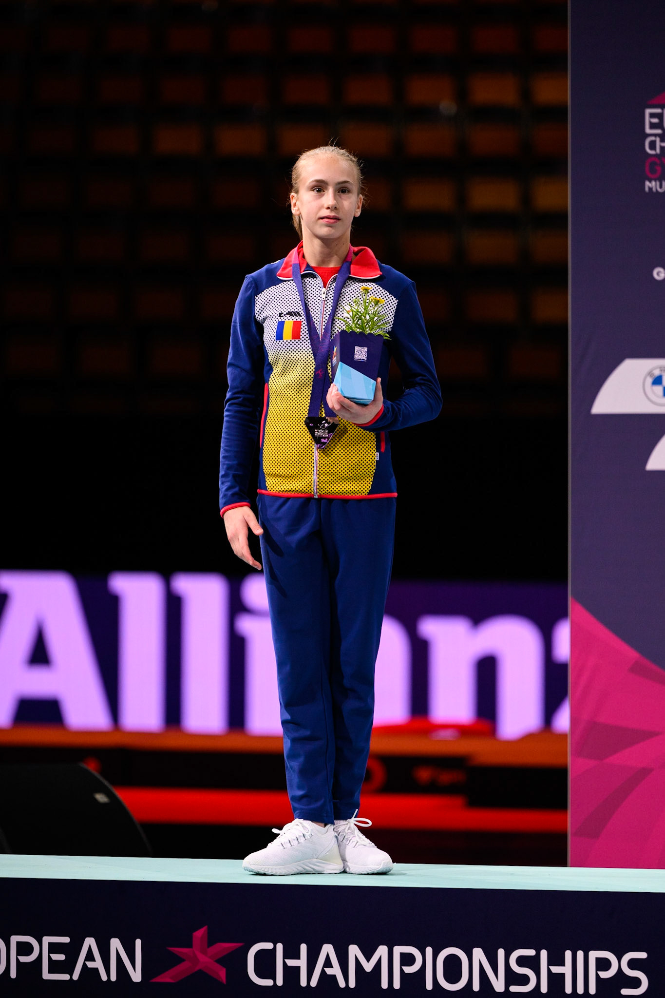 European Championships 2022, All-around Competition, Victory CeremonyDepicted: Amaila GhigoartaPhoto taken in Munich, DEU on 2022-08-12Photo credits should read: Norman Seibert, CC BY-SA 4.0NIKON Z 9, NIKKOR Z 70-200mm f/2.8 VR S¹⁄₃₂₀ Sek. bei ƒ / 2,8File: DSC_9162.NEF
