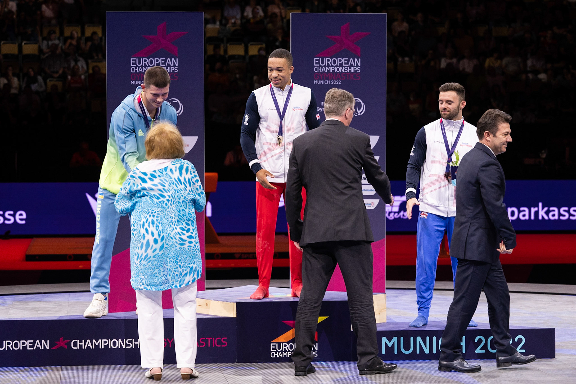 European Championships 2022, Apparatus Final, Parallel BarsDepicted: Illia Kovtun, Giarnni Regini-Moran, Joe FraserPhoto taken in Munich, DEU on 2022-08-21Photo credits should read: Norman Seibert, CC BY-SA 4.0NIKON Z 9, NIKKOR Z 70-200mm f/2.8 VR S¹⁄₈₀₀ Sek. bei ƒ / 4,0File: DSC_6998.NEF