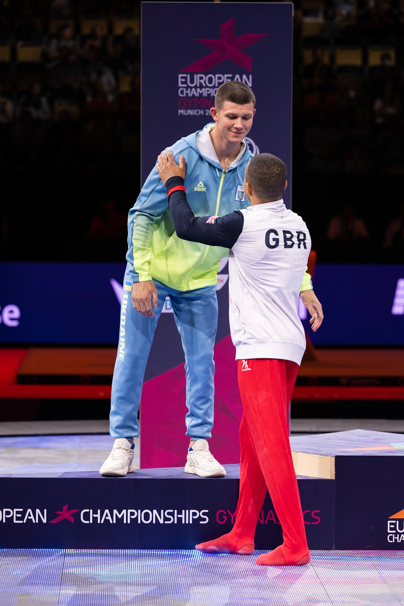 European Championships 2022, Apparatus Final, Parallel BarsDepicted: Joe Fraser, Illia KovtunPhoto taken in Munich, DEU on 2022-08-21Photo credits should read: Norman Seibert, CC BY-SA 4.0NIKON Z 9, NIKKOR Z 70-200mm f/2.8 VR S¹⁄₈₀₀ Sek. bei ƒ / 4,0File: DSC_6993.NEF