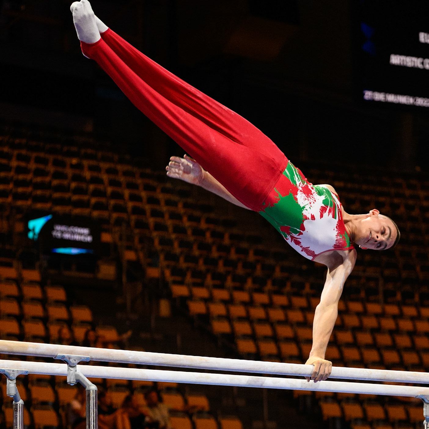 European Championships 2022, Podium Training, Parallel BarsDepicted: Rayan RadkovPhoto taken in Munich, DEU on 2022-08-16Photo credits should read: Norman Seibert, CC BY-SA 4.0NIKON Z 9, NIKKOR Z 70-200mm f/2.8 VR S¹⁄₁₆₀₀ Sek. bei ƒ / 2,8File: DSC_6896.NEF