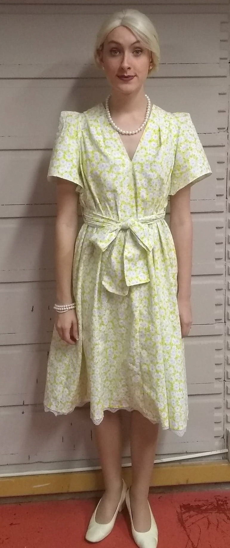 Amy Lee wears the same dress as Hattie but tailored to fit her more flatteringly. She also has had some lace details added.