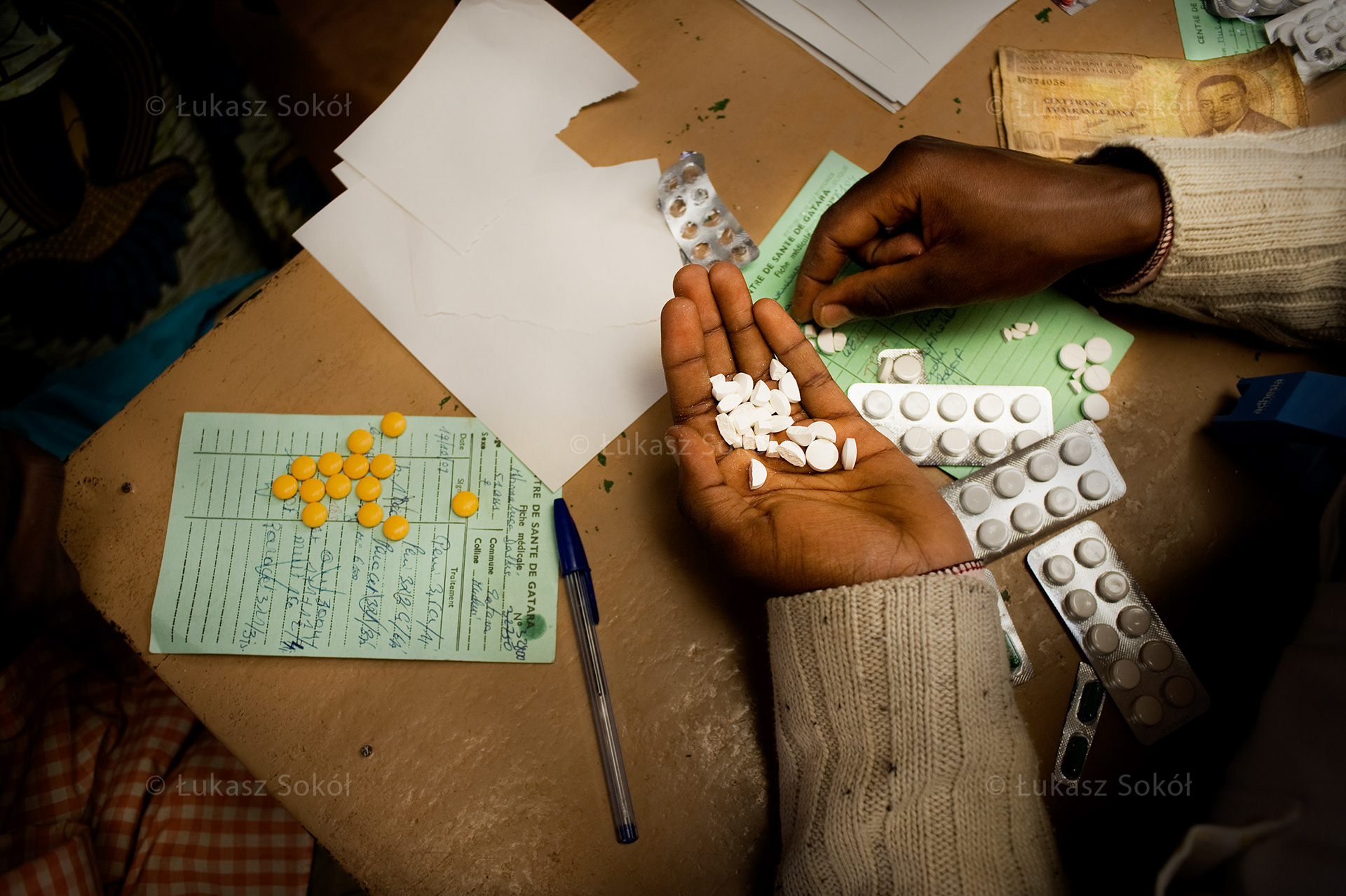 Malaria epidemic in Burundi. Distribution of malaria drugs in the health center run by Polish missionaries, the Sisters of the Canonesses of the Holy Spirit in the town of Gatara. Gatara, Burundi, 2010`