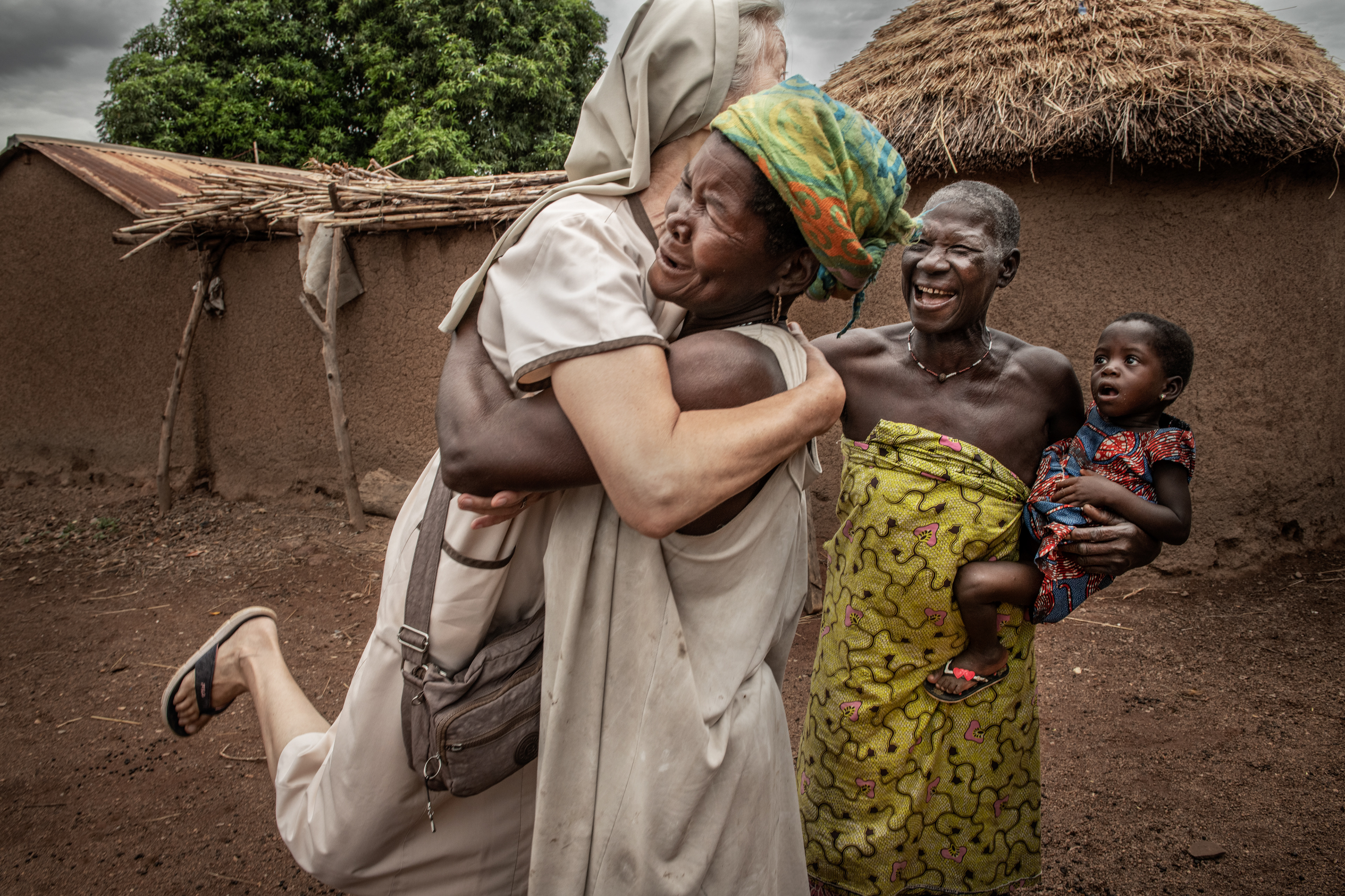 Villagers of Nampoch welcome Sister Alice from the Congregation of the Sisters of St. Catherine. Togo 2023