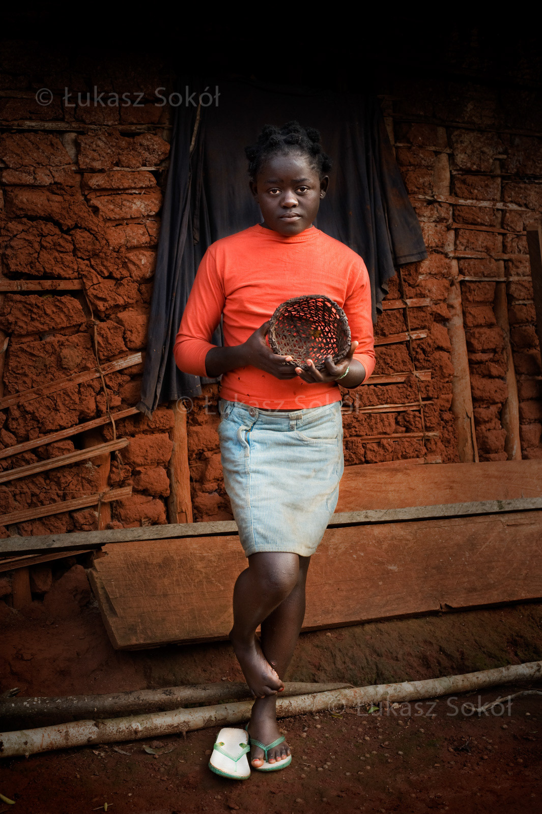 Roseline Mimbiol, 12 years old, she has 2 sisters and a brother. After school she washes the dishes and brings water. She picks coffee to her little woven basket from her mother and then she sells it. When she grows up, she is going to be a doctor. Ouama, Cameroon, 2009