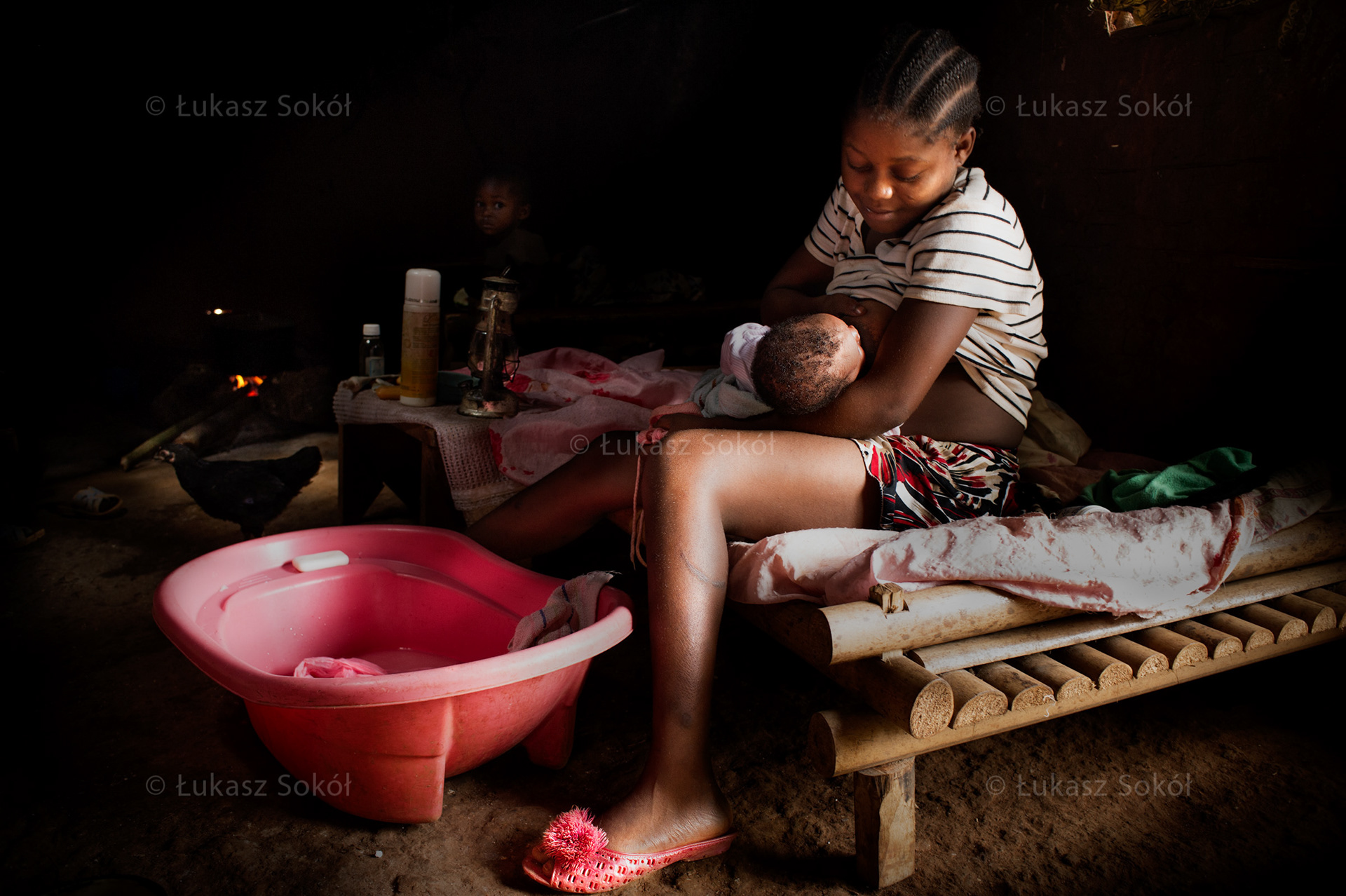 Vianny Embaltou, 15 years old, mother of 2 weeks Priscilia, finished her education at 4th grade. The child's father continues his education in a town several hundred kilometers from her. He does not help her in taking care of the child. There is no one who could support her except her aunt who is 23 years old and has already 5 children.  Djouth, Cameroon, 2012