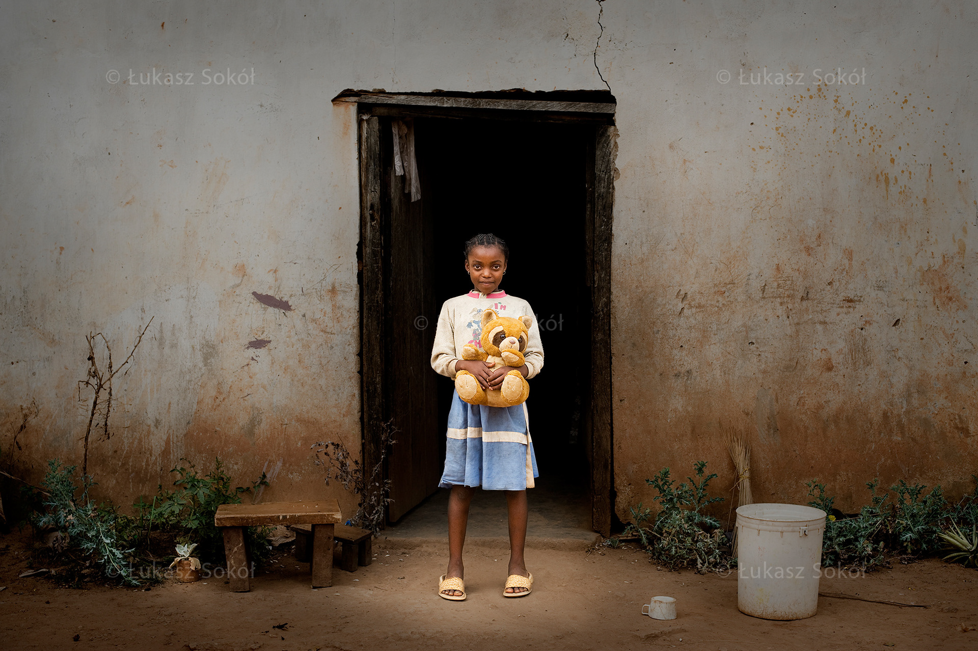 Oscarine Nahodo, aged 11, she has got 2 siblings, they live only with their mother. One day she is going to be a nurse and she is planning to live in a pretty house. She got the teddy bear from nuns. Betare-Oya, Cameroon, 2009