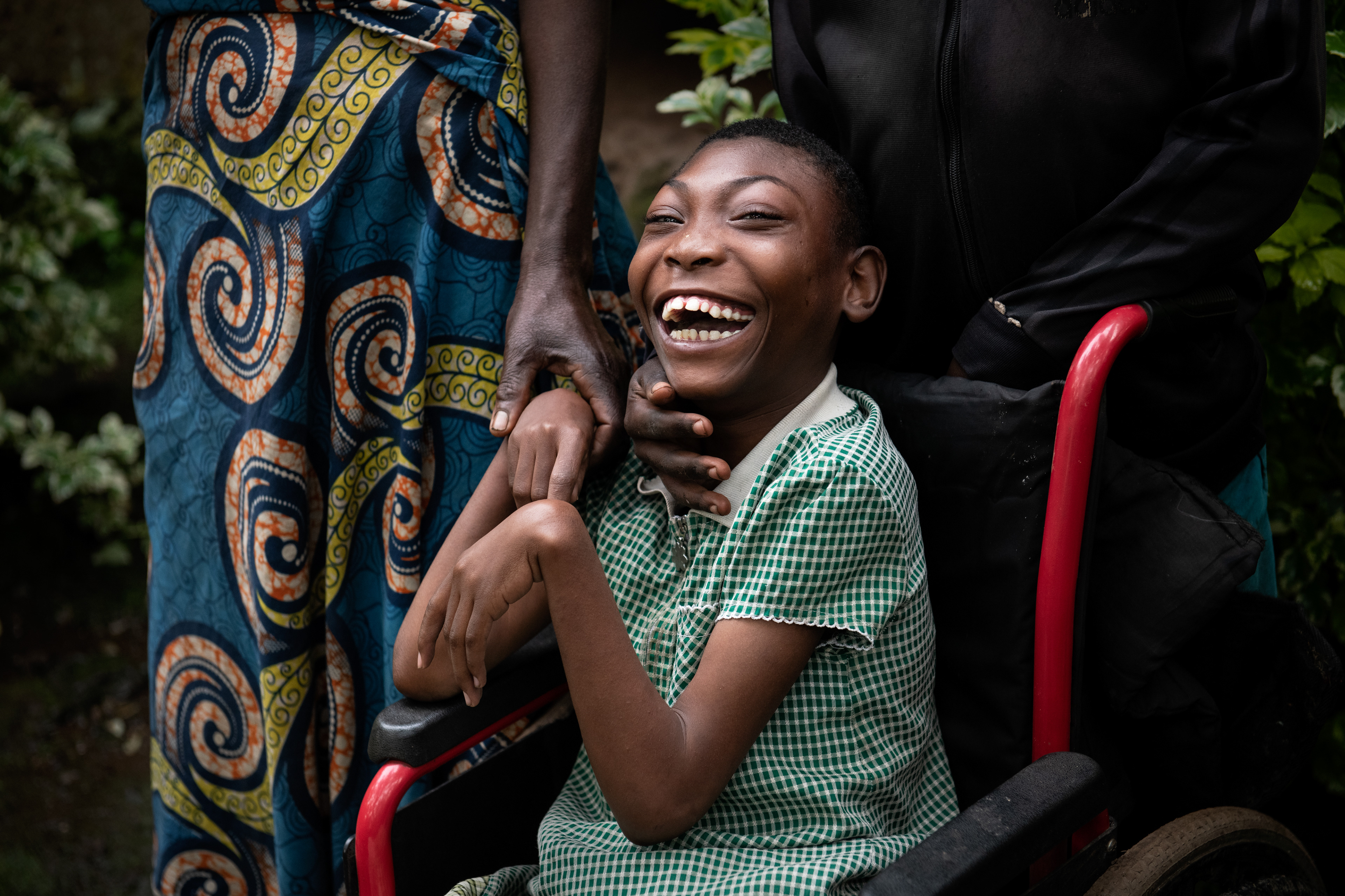 Sandrine suffers from quadriplegia and epilepsy. Her mother abandoned her after she was born when it turned out she was disabled. She is cared for by her grandmother, who surrounds her with great love. For years, her son helped her grandmother in caring for Sandrine. After his unexpected death, she takes care of her alone. Due to her age, she is no longer able to cultivate the plot of land she owns. She rents it to others in exchange for a share of the crops. The grandmother worries about the future of her granddaughter, who will have no one to care for her after she leaves.  Nyarutembe, Rwanda 2019