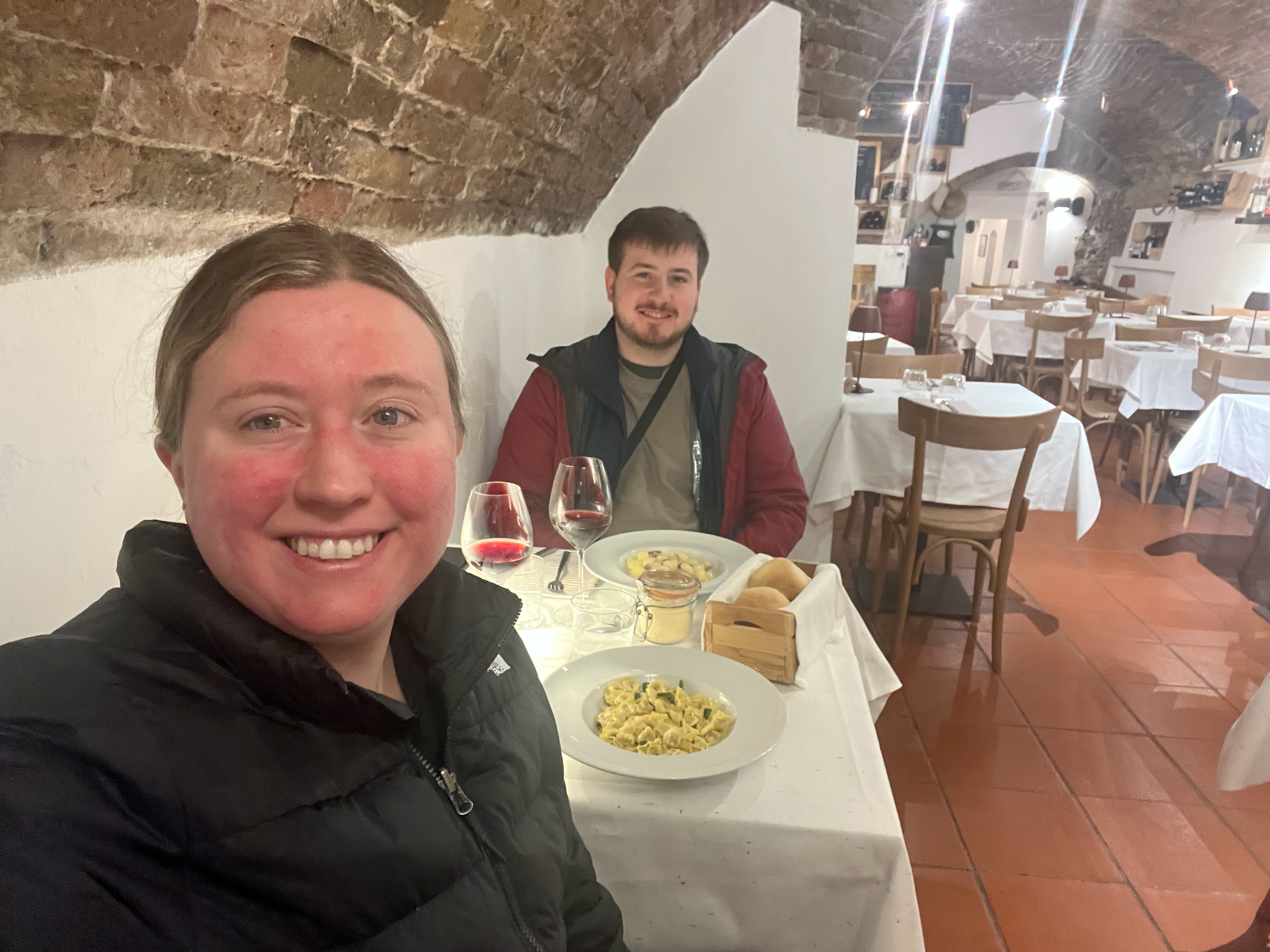 Emilie and Daniel with their dinner at Osteria La Fregola