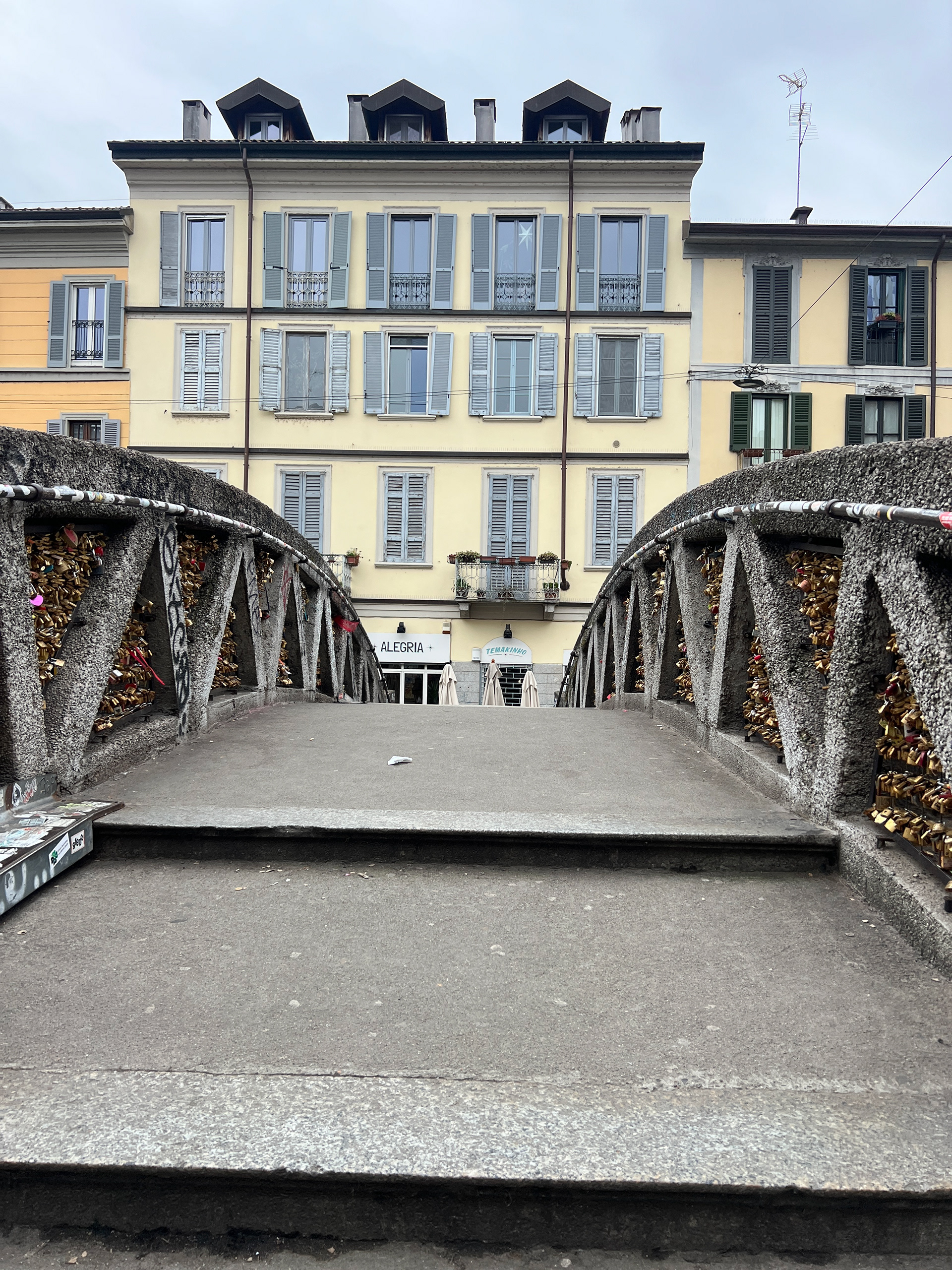 A bridge on Naviglio Grande filled with locks