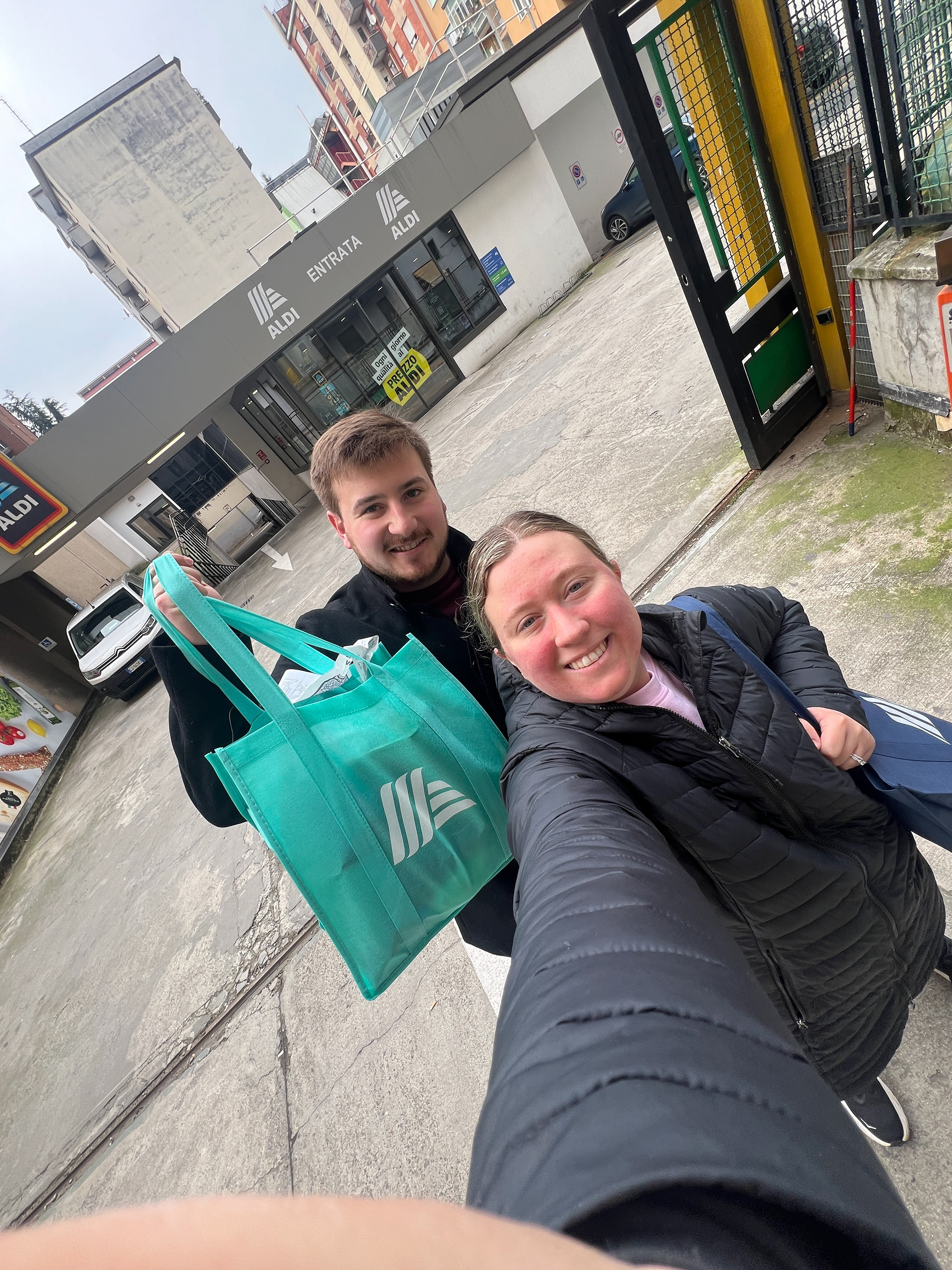 Daniel and Emilie with their groceries from Aldi