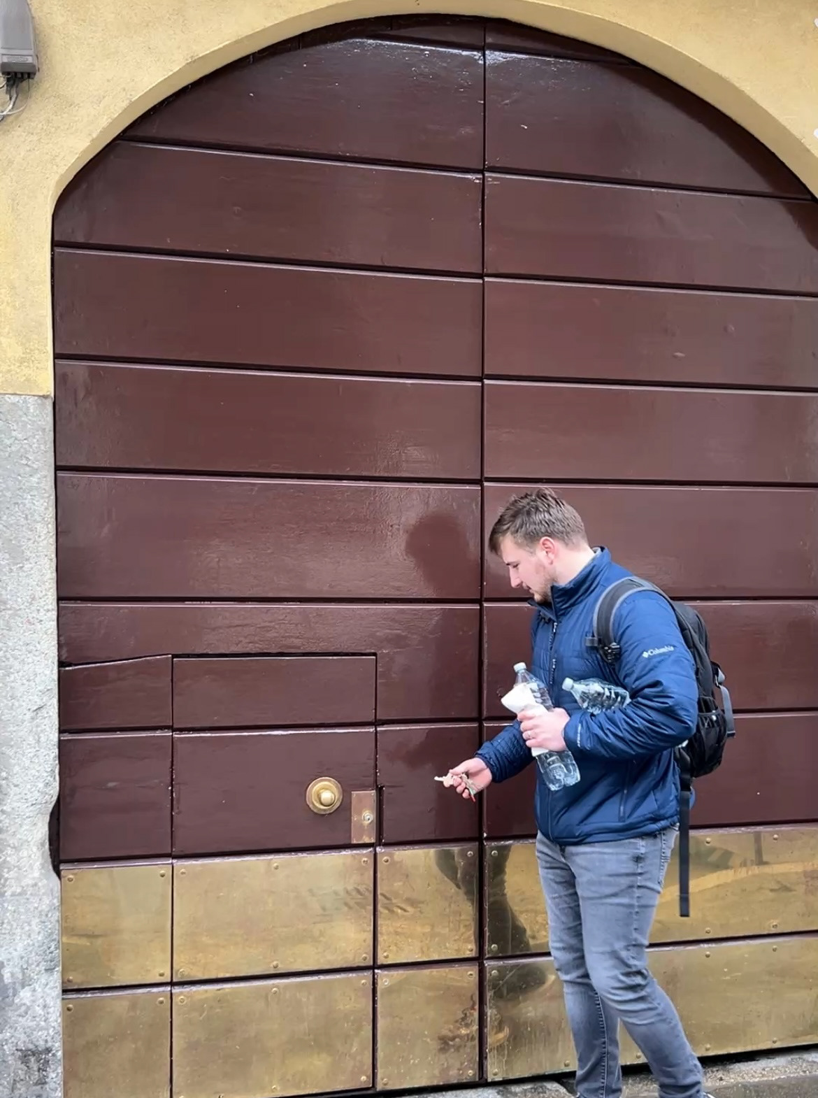 The door we enter from the street to get to the courtyard our apartment is in