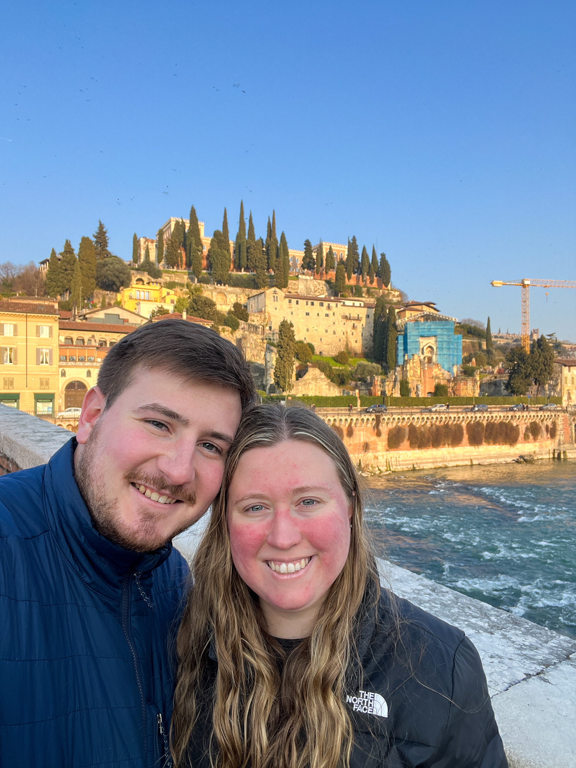 Daniel and Emilie with Castel San Pietro and the Adige river in the background