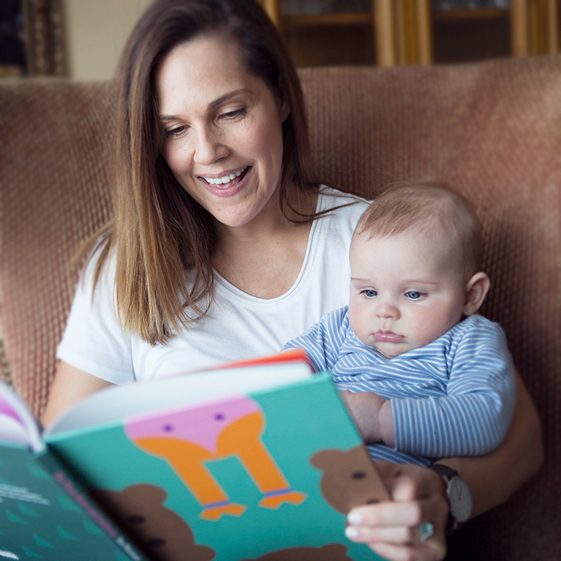 Baby Jack reading his book
