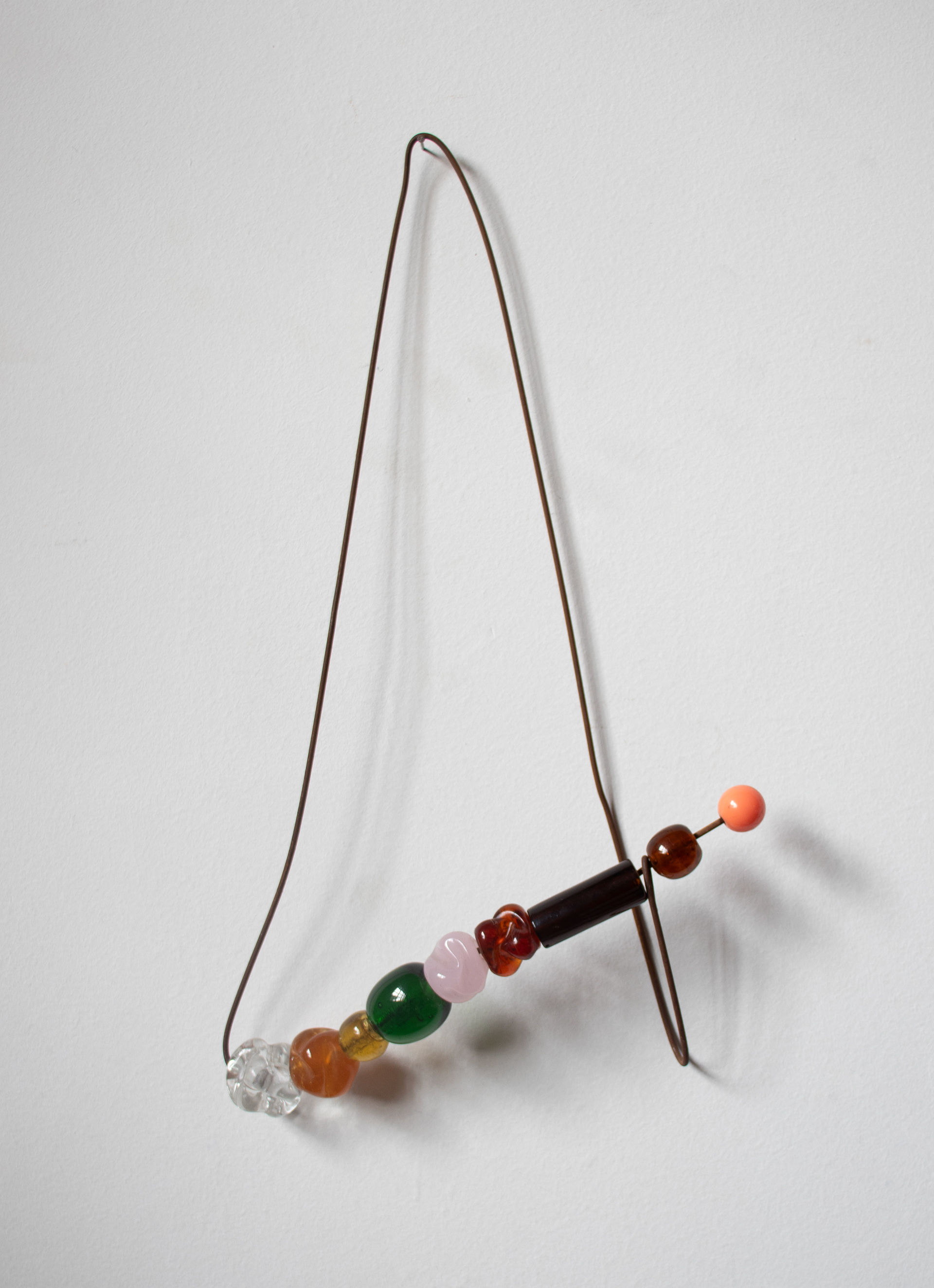Tulio Costa. Acessório de parede #6, 2022, metal encontrado, Murano e esfera de acrílico, 35 × 20 × 4 cm (TC059)
