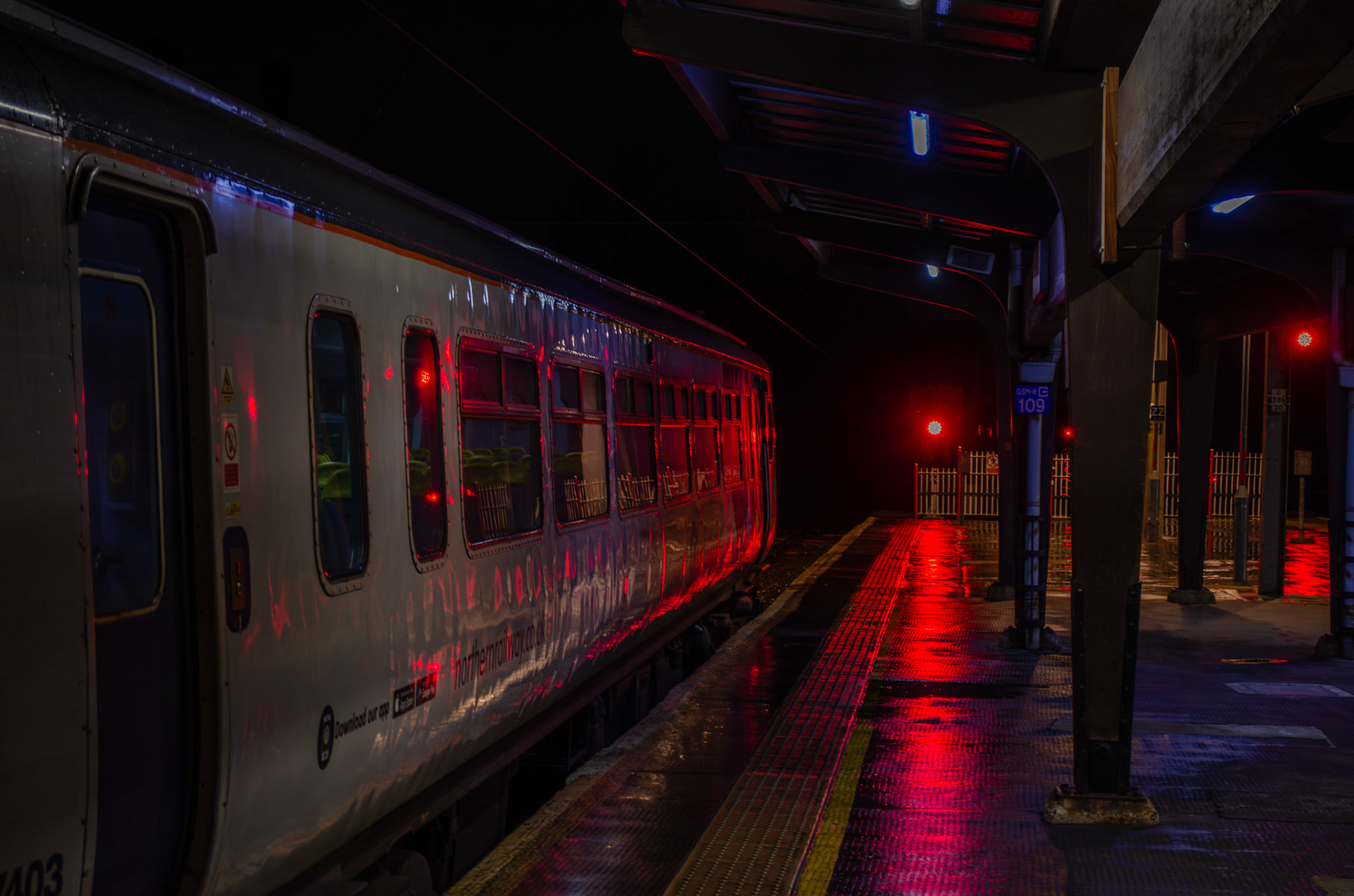 A glaring red signal demands the train not depart.