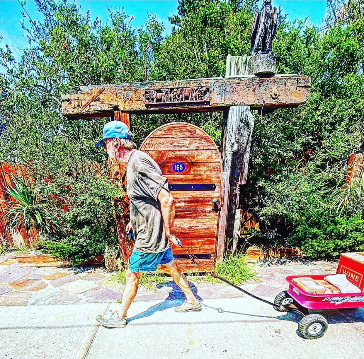 Man and the wagon. Fire Island NY.