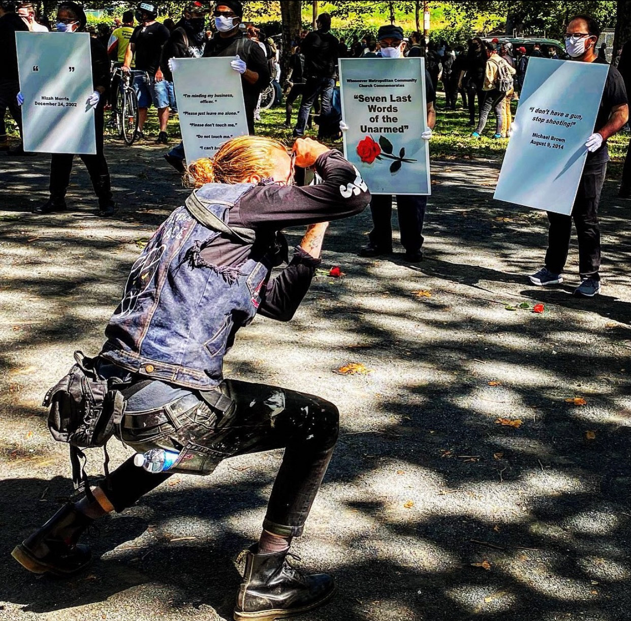 Photographing the photographer. Anti-hate rally.