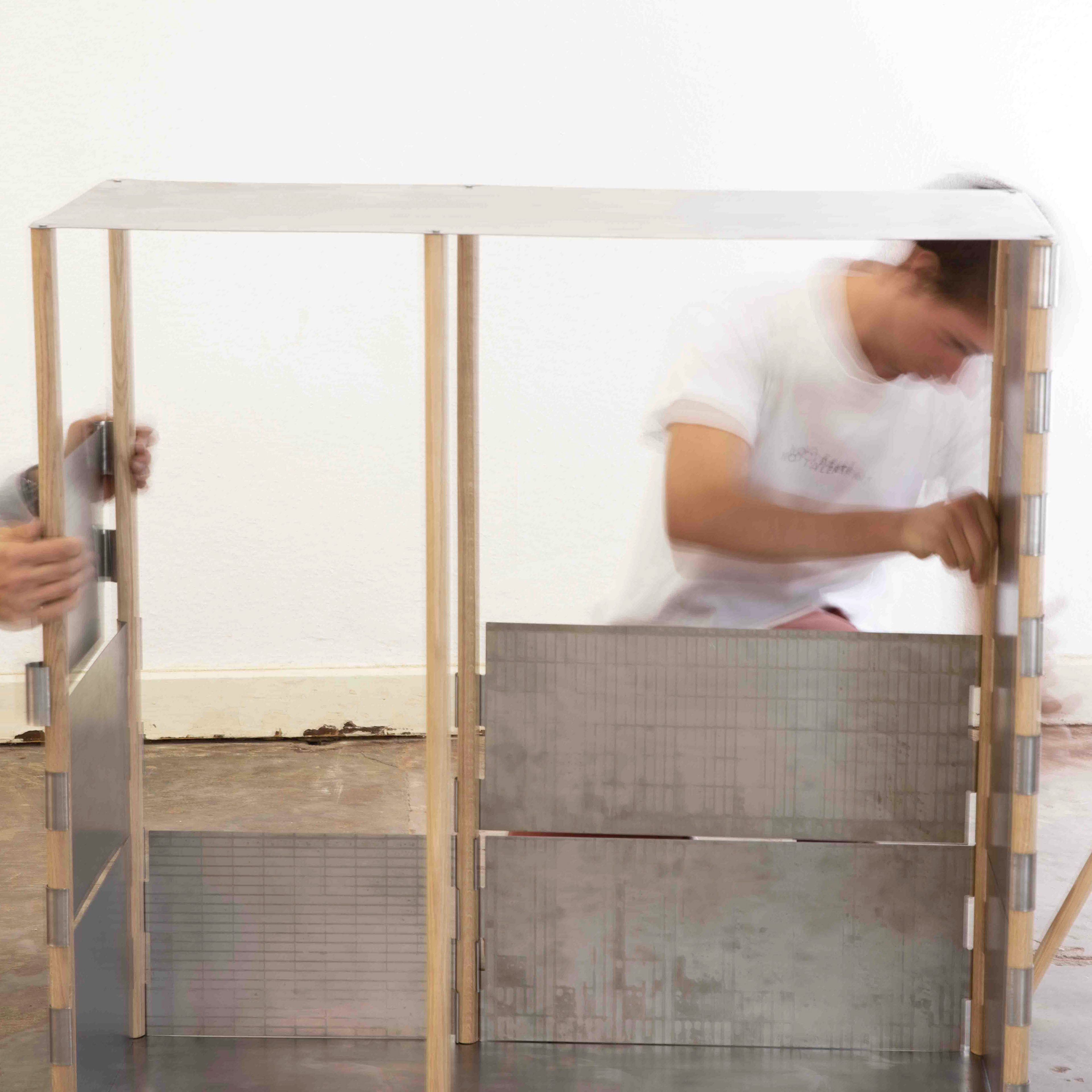 1:1 model of the sheet metal clipping on wooden rods design.