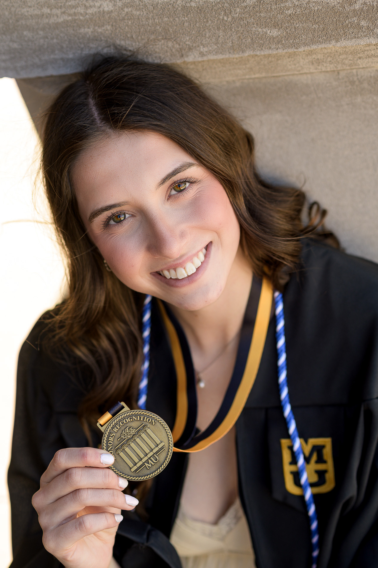 Professional College Senior portrait in Missouri. Capturing the joy and achievement of graduation day with high-quality photography.