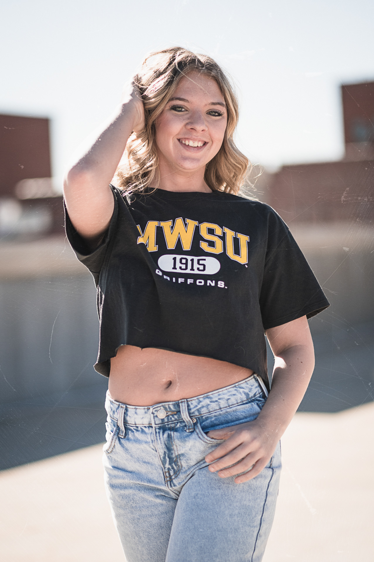 Urban style senior portrait session for high school graduates in Kansas City. Creative outdoor photography using natural light and professional posing in downtown environments.