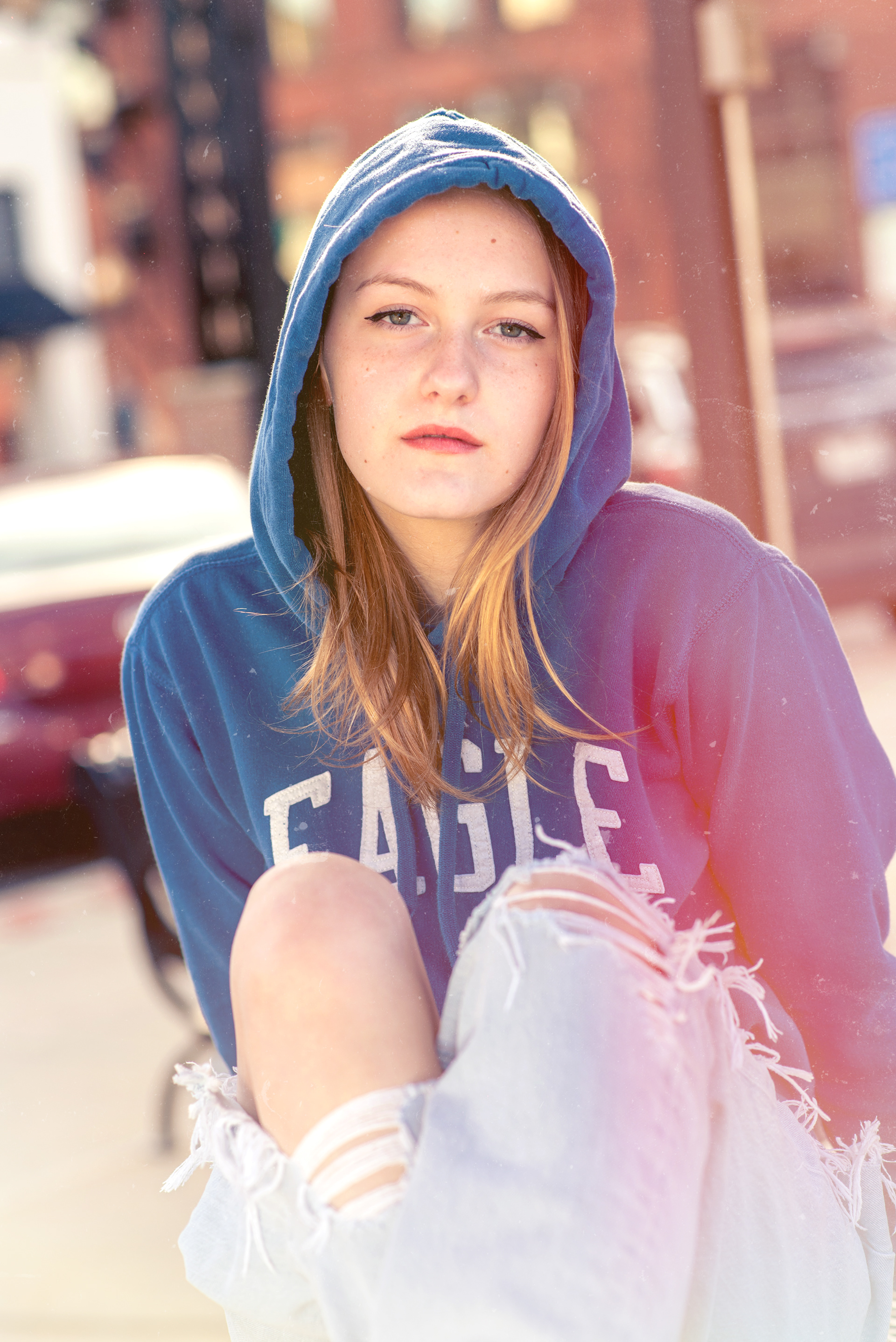 Urban style senior portrait session for high school graduates in Kansas City. Creative outdoor photography using natural light and professional posing in downtown environments.