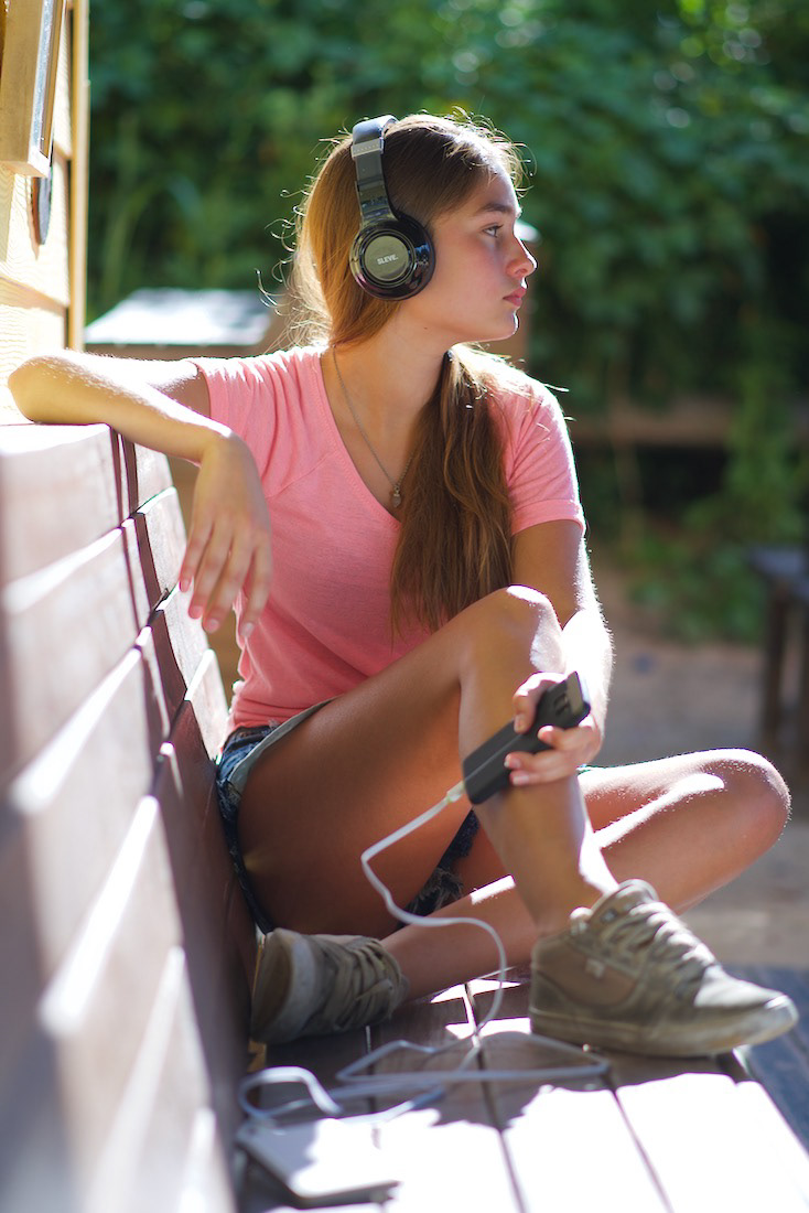 Custom senior photo session featuring a motorcycle for a unique, editorial look. Personalized graduation portraits in St. Joseph Missouri that capture individual personality and style.