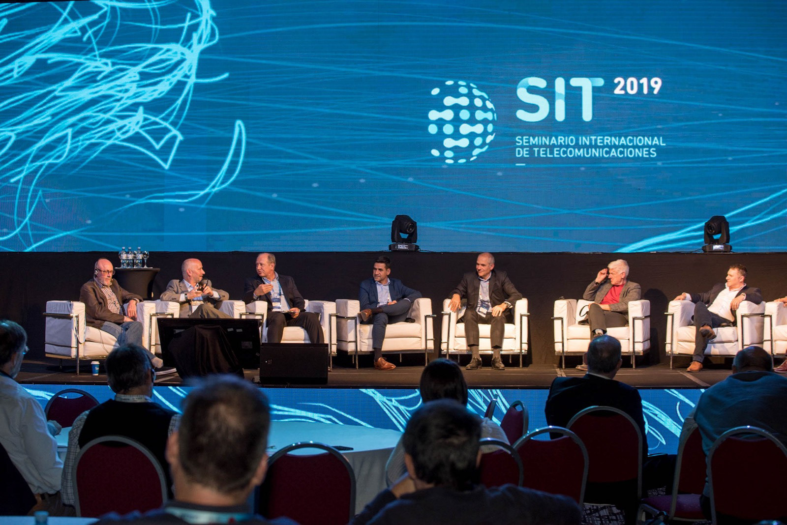 Corporate event photography for business summits, conferences, and networking galas in Kansas City. Comprehensive coverage of speakers, audience engagement, and brand sponsors.