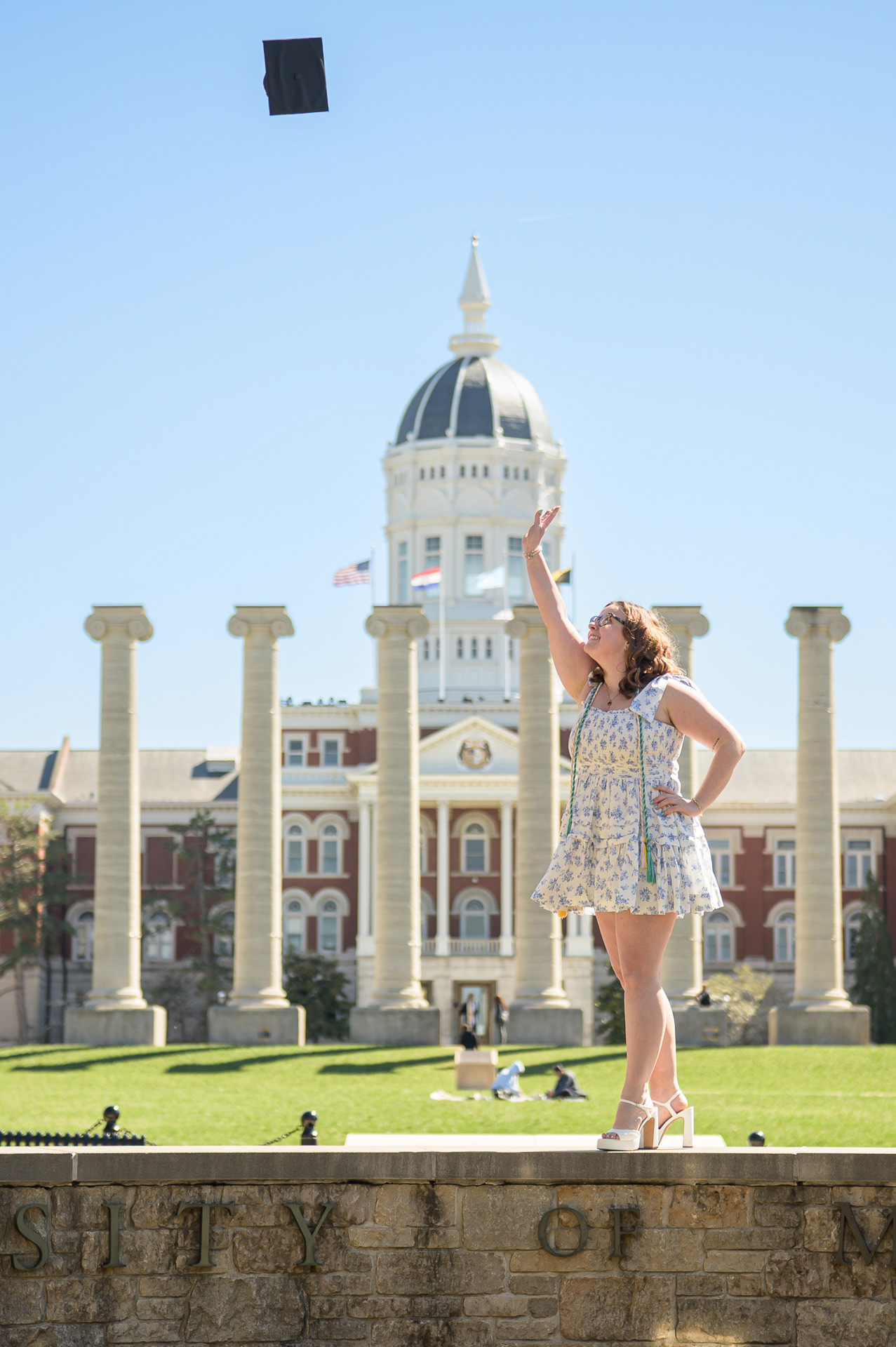 Graduation photo session in Columbia, MO. Professional portraits for university students across the Missouri region by Fernando Porpora Photography.