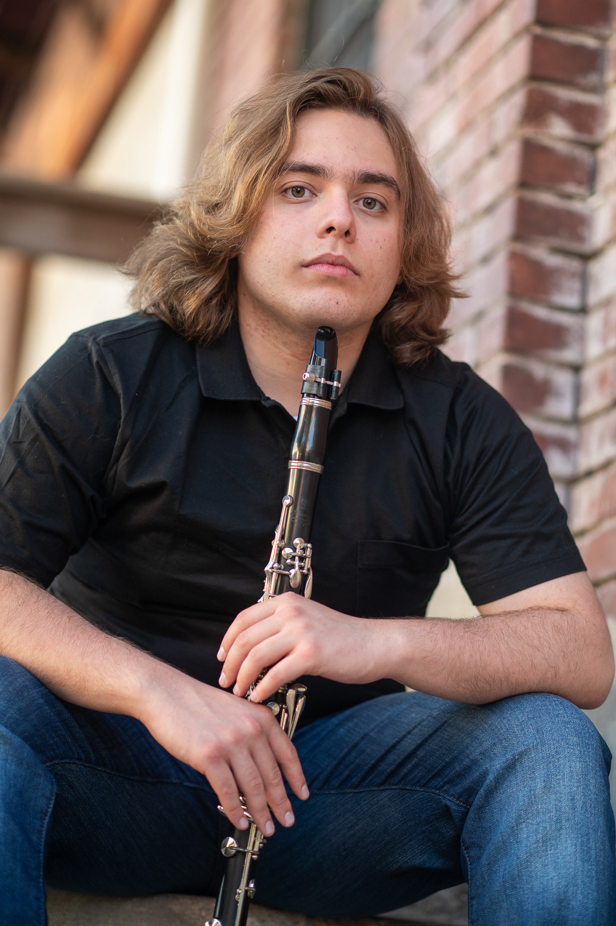 Custom senior photo session featuring a motorcycle for a unique, editorial look. Personalized graduation portraits in St. Joseph Missouri that capture individual personality and style.