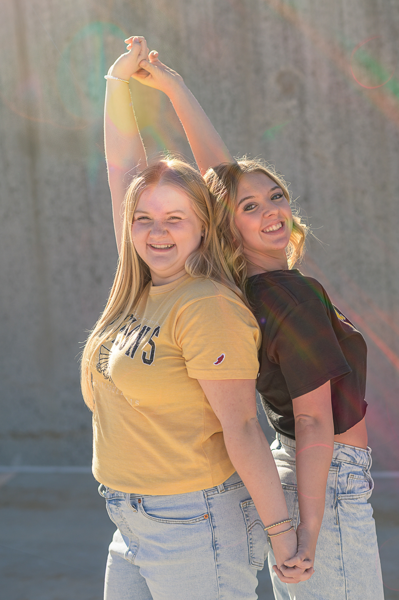 Urban style senior portrait session for high school graduates in Kansas City. Creative outdoor photography using natural light and professional posing in downtown environments.