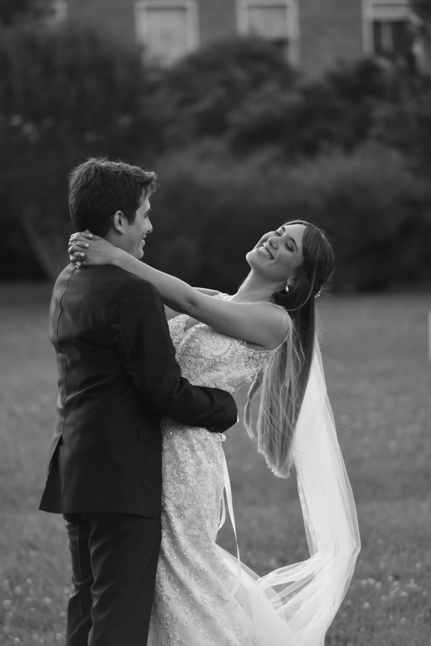 Artistic engagement photo session in St. Joseph MO. Personalized outdoor portraits for couples seeking high-quality imagery to celebrate their unique connection before the wedding.