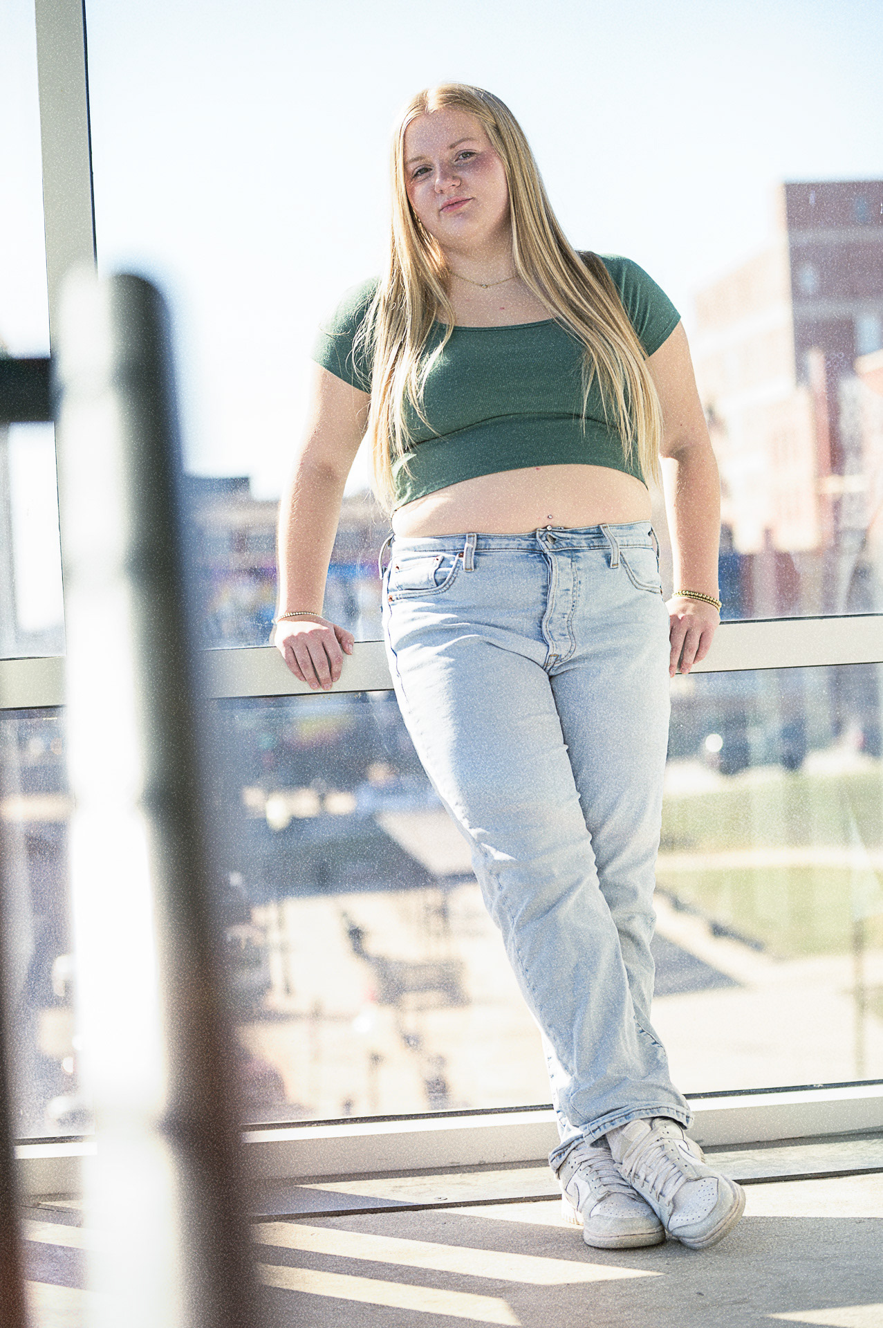 Urban style senior portrait session for high school graduates in Kansas City. Creative outdoor photography using natural light and professional posing in downtown environments.