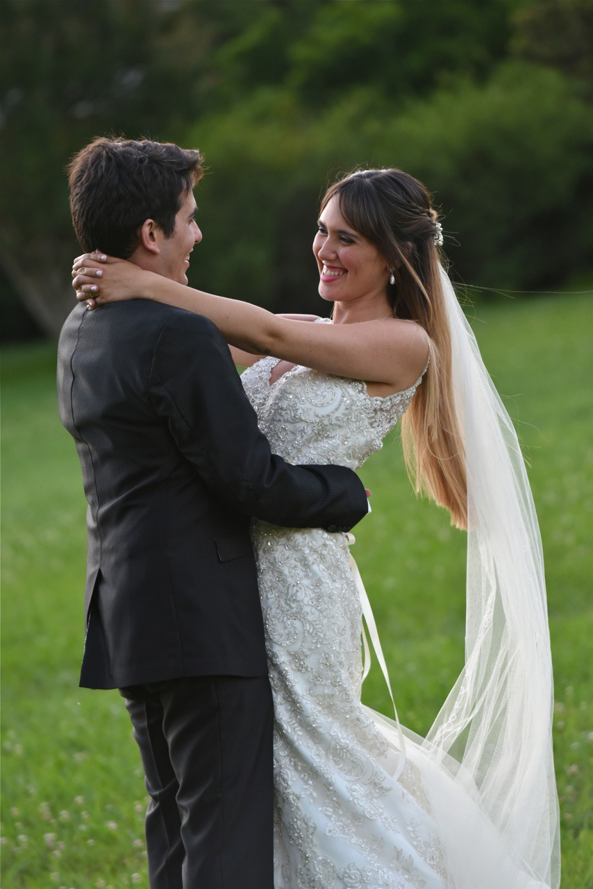 Artistic engagement photo session in St. Joseph MO. Personalized outdoor portraits for couples seeking high-quality imagery to celebrate their unique connection before the wedding.