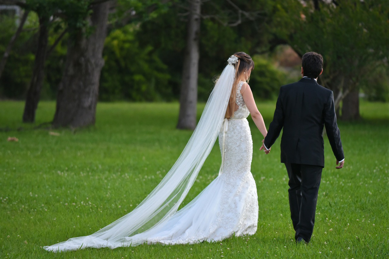 Artistic engagement photo session in St. Joseph MO. Personalized outdoor portraits for couples seeking high-quality imagery to celebrate their unique connection before the wedding.