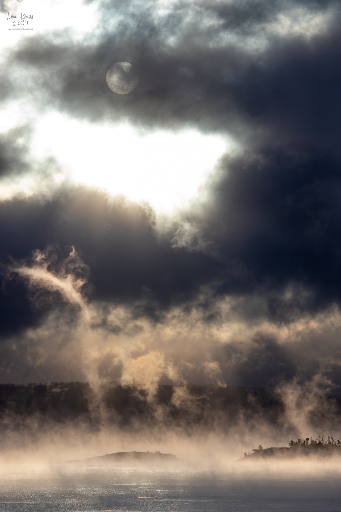 Filaments of morning mist rising in frigid temperatures over Lake Superior - January 15, 2024