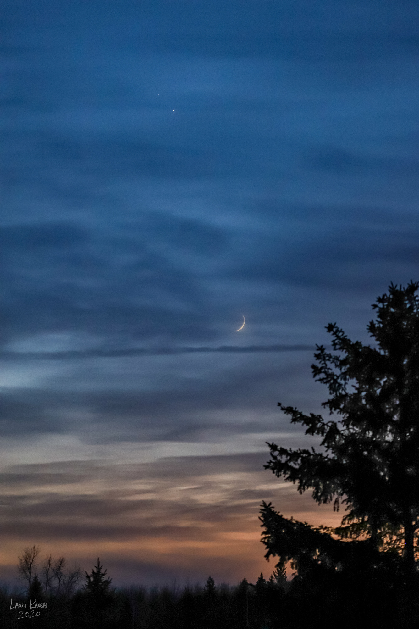 Crescent Moon, Jupiter and Saturn Through Clouds - December 16, 2020