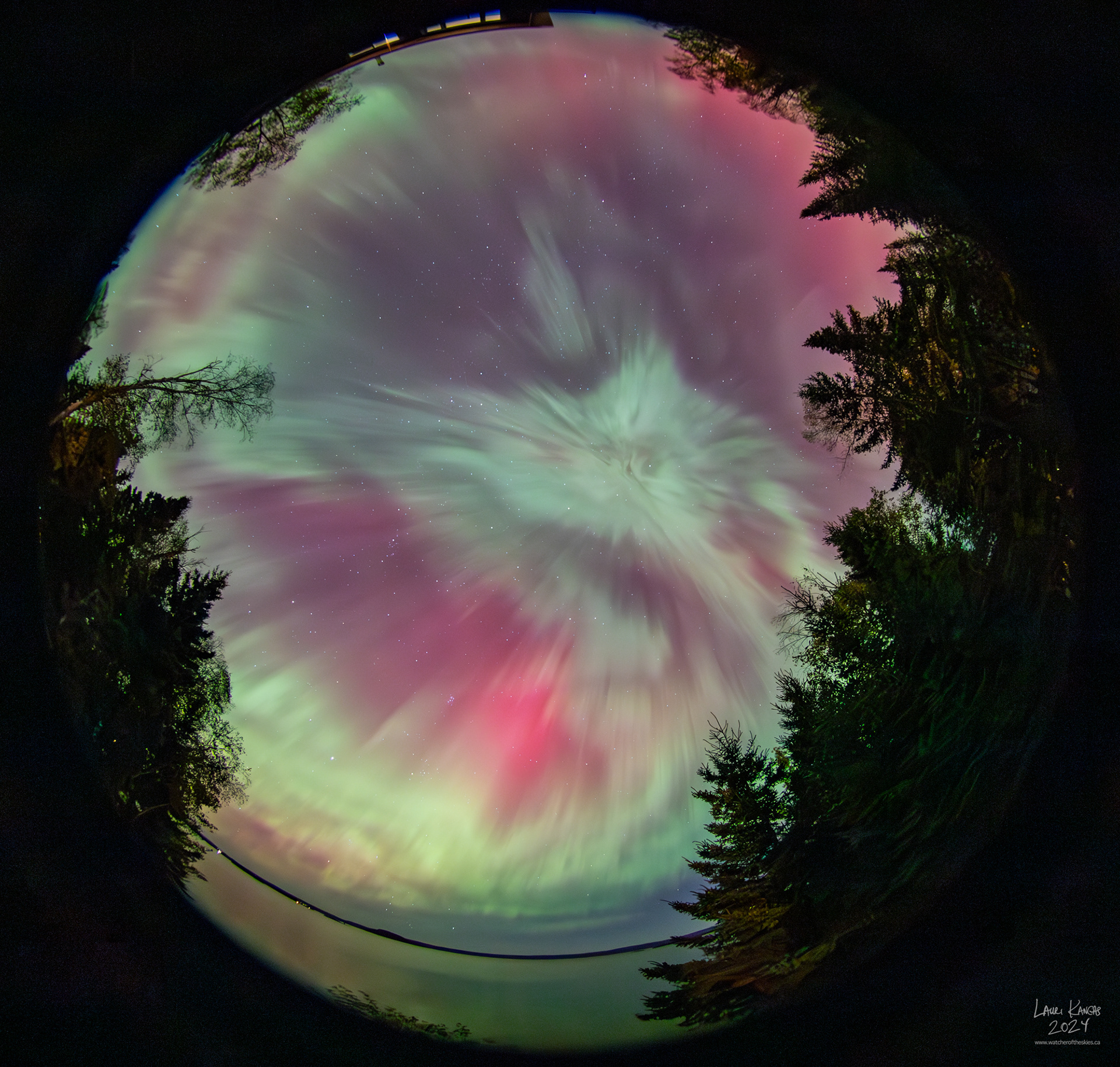 Full sky image of intense red and green colours during G3 storm