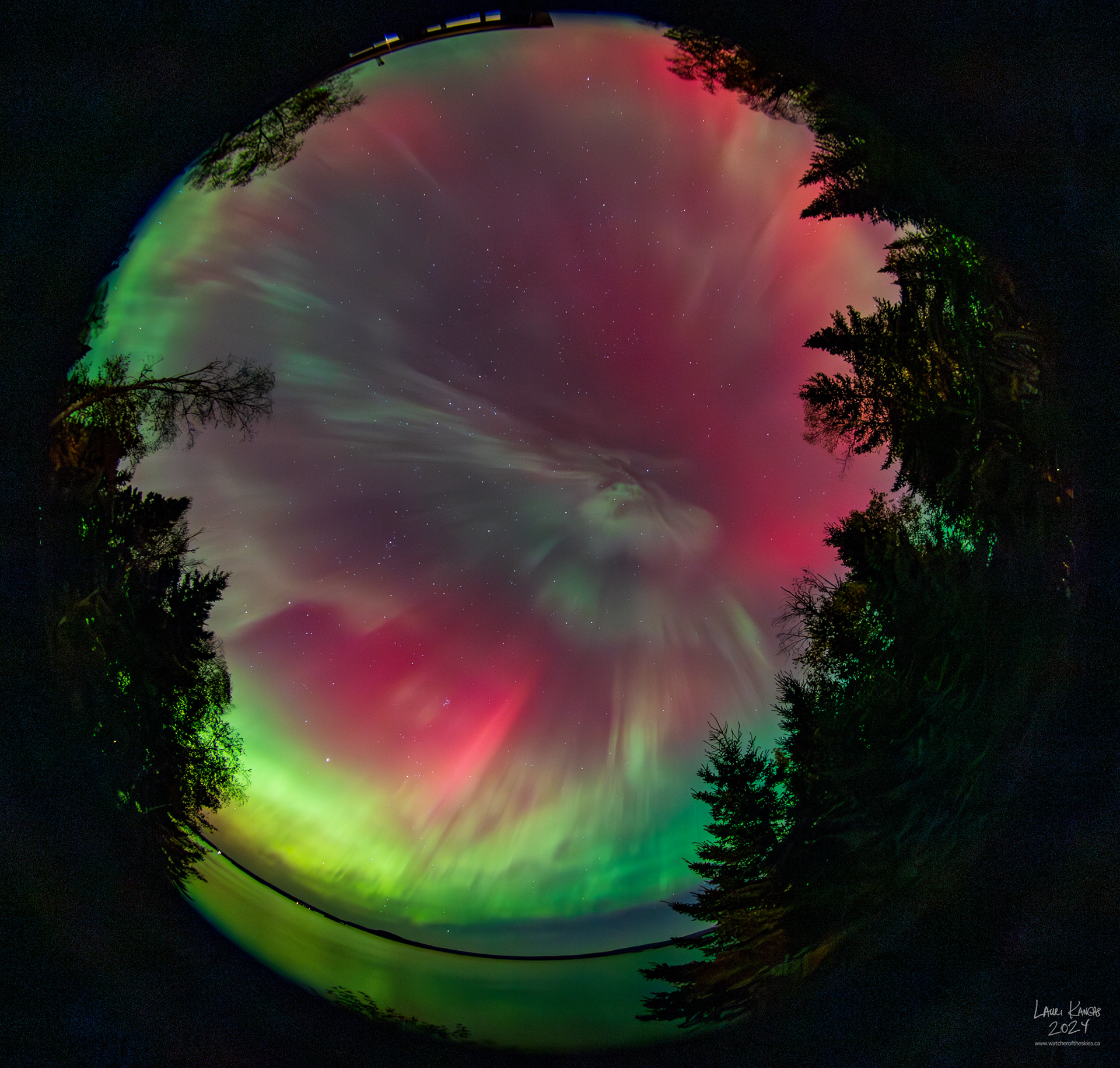 Full sky image of intense red and green colours during G3 storm