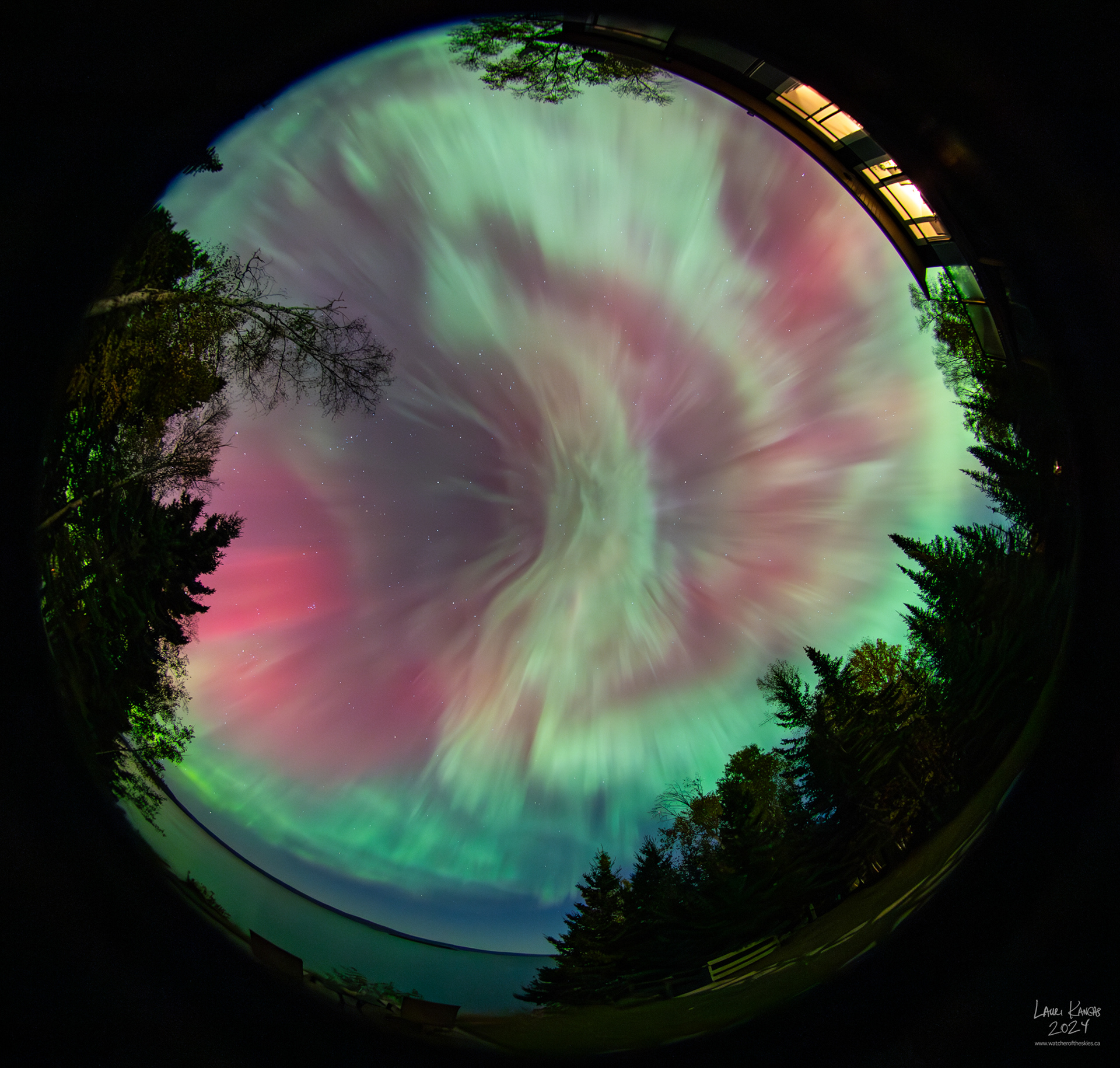 Full sky image of intense red and green colours during G3 storm
