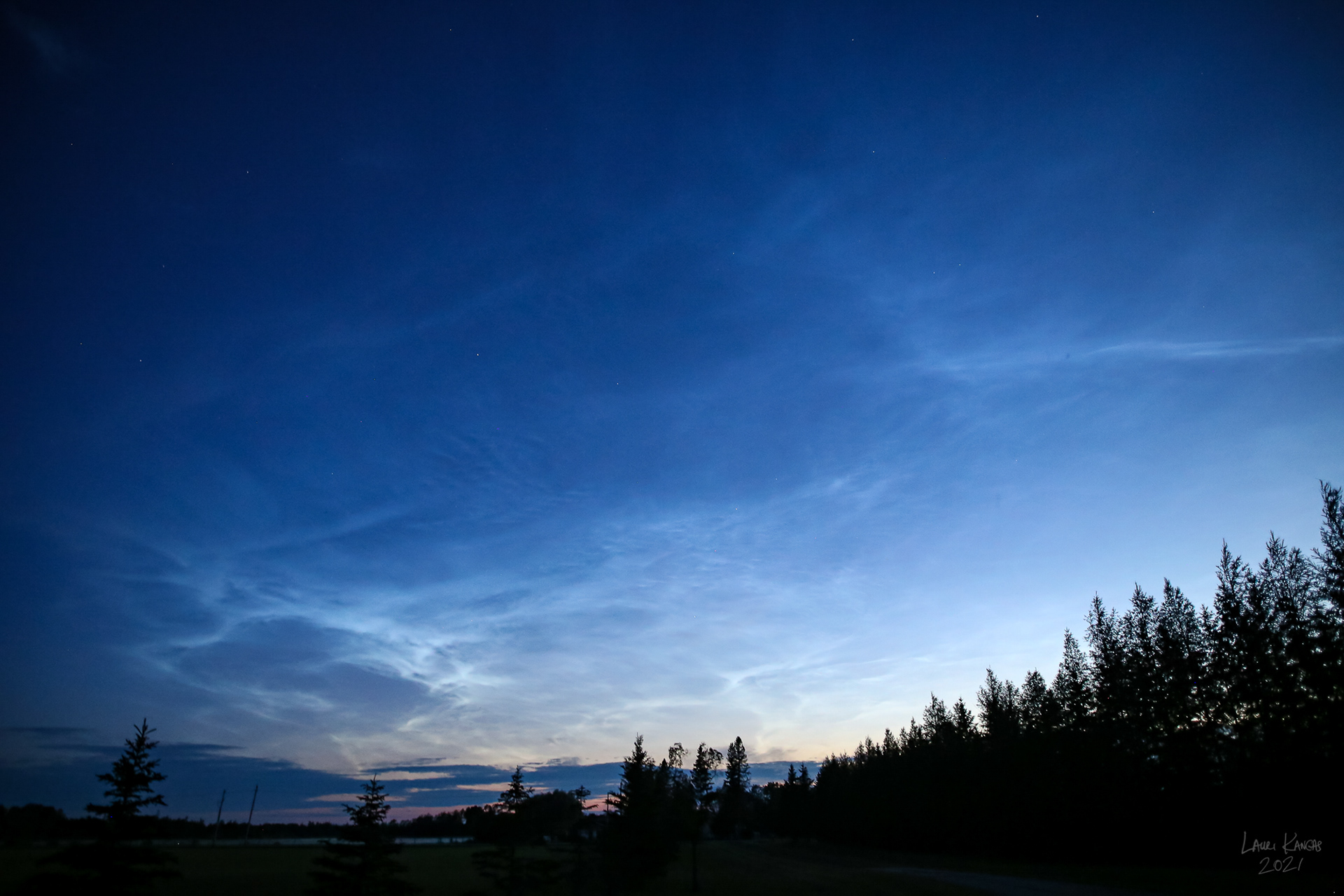 Noctilucent Clouds at Sunset Spanning from due West to due North - June 27, 2021