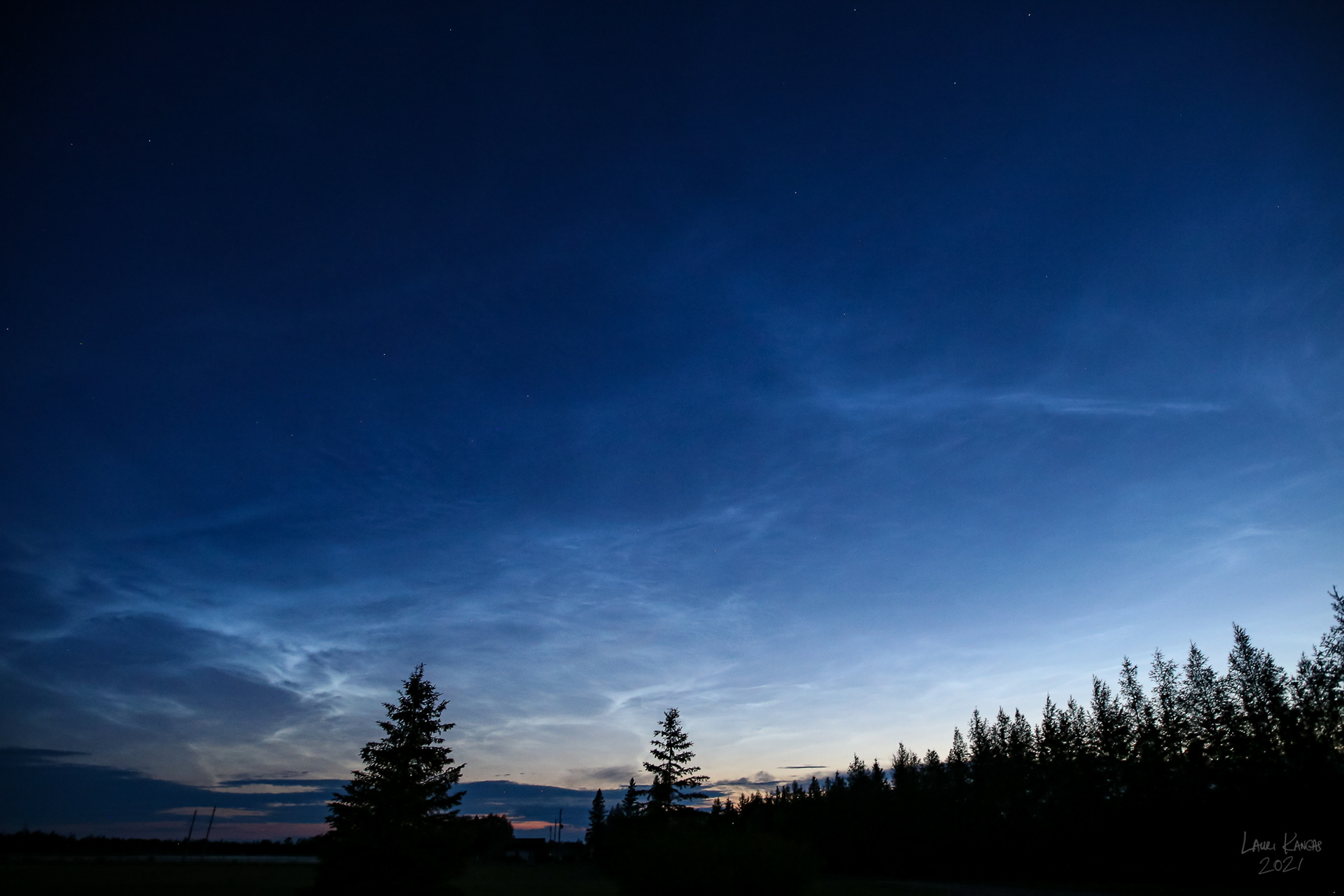 Noctilucent Clouds at Sunset Spanning from due West to due North - June 27, 2021