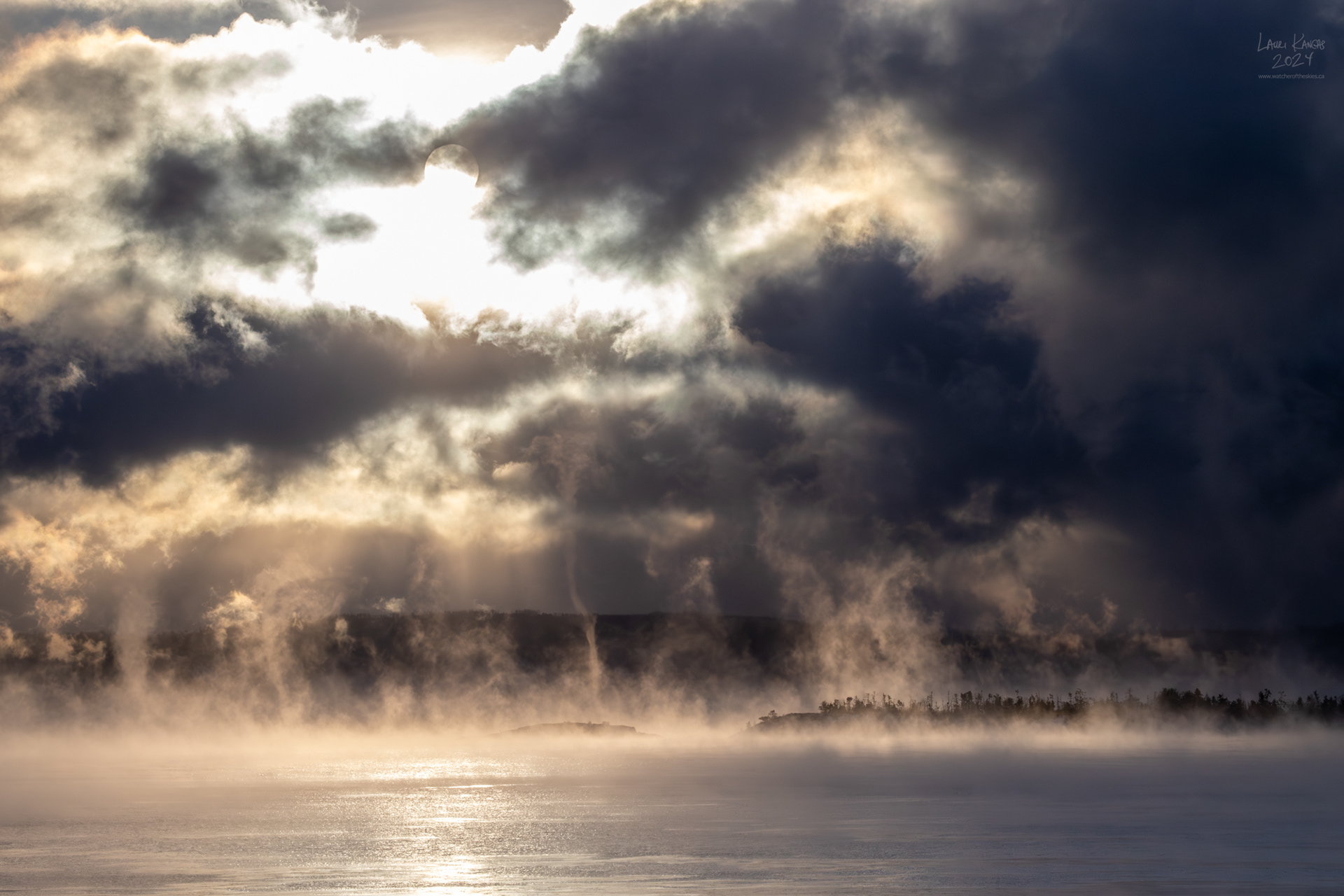 Filaments of morning mist rising in frigid temperatures over Lake Superior - January 15, 2024